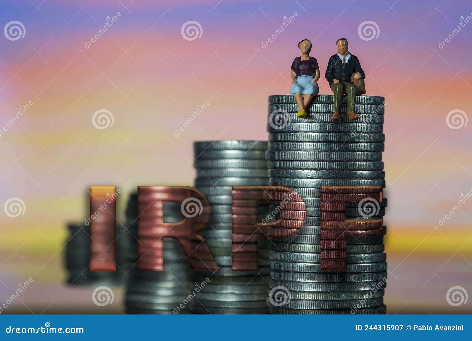income tax campaign spain. young couple sitting on coin stack. declaracion de la renta. macro