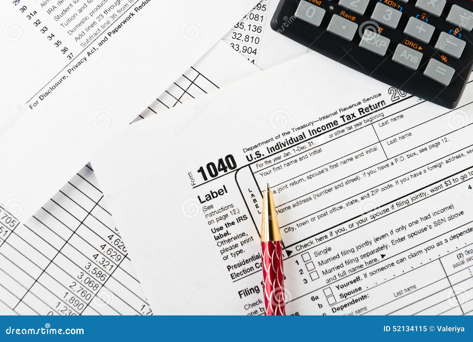 income-tax-return-with-pen-and-calculator-editorial-image-image-of