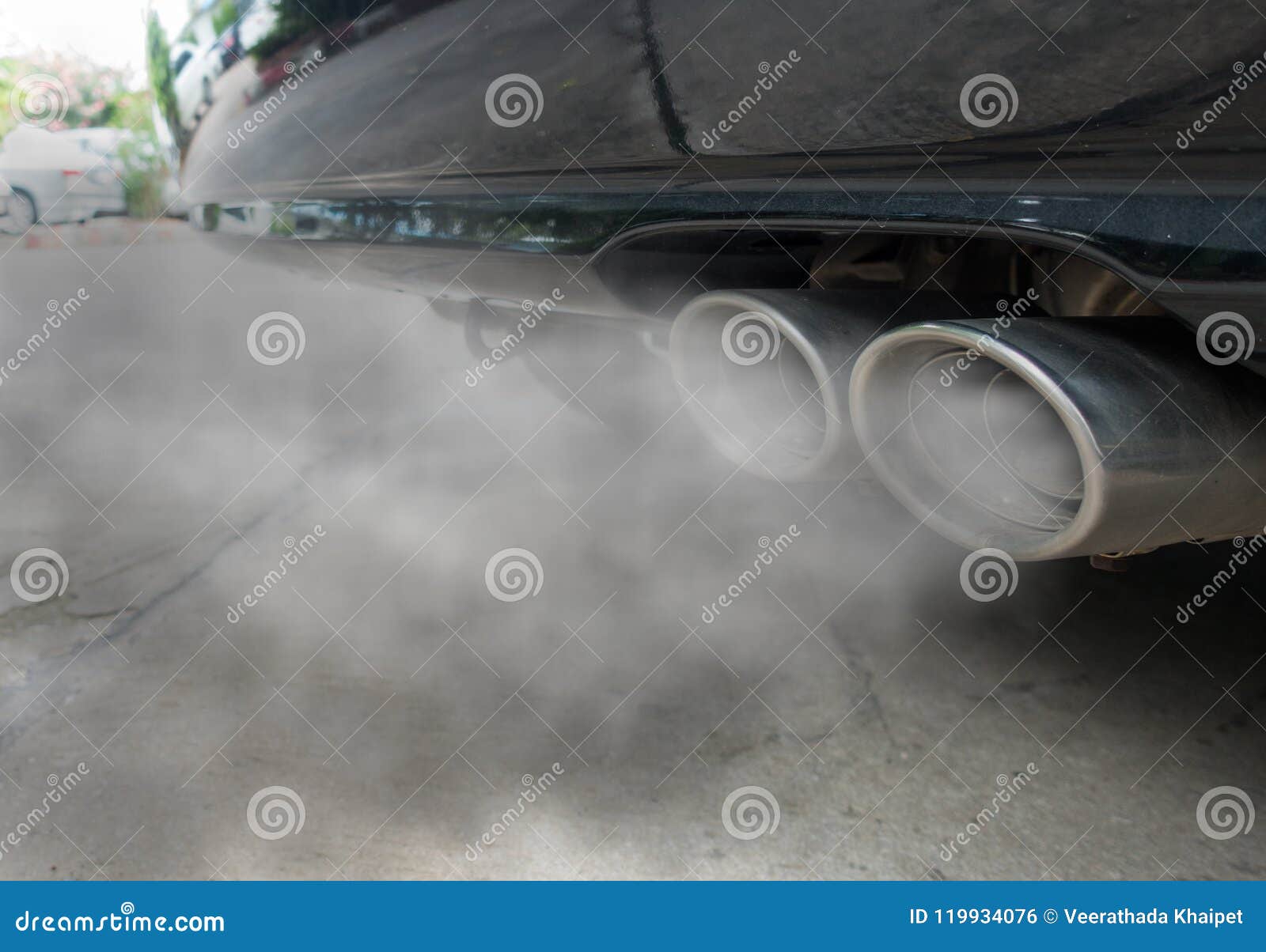 incomplete combustion creates poisonous carbon monoxide form exhaust pipe of black car, air pollution concept