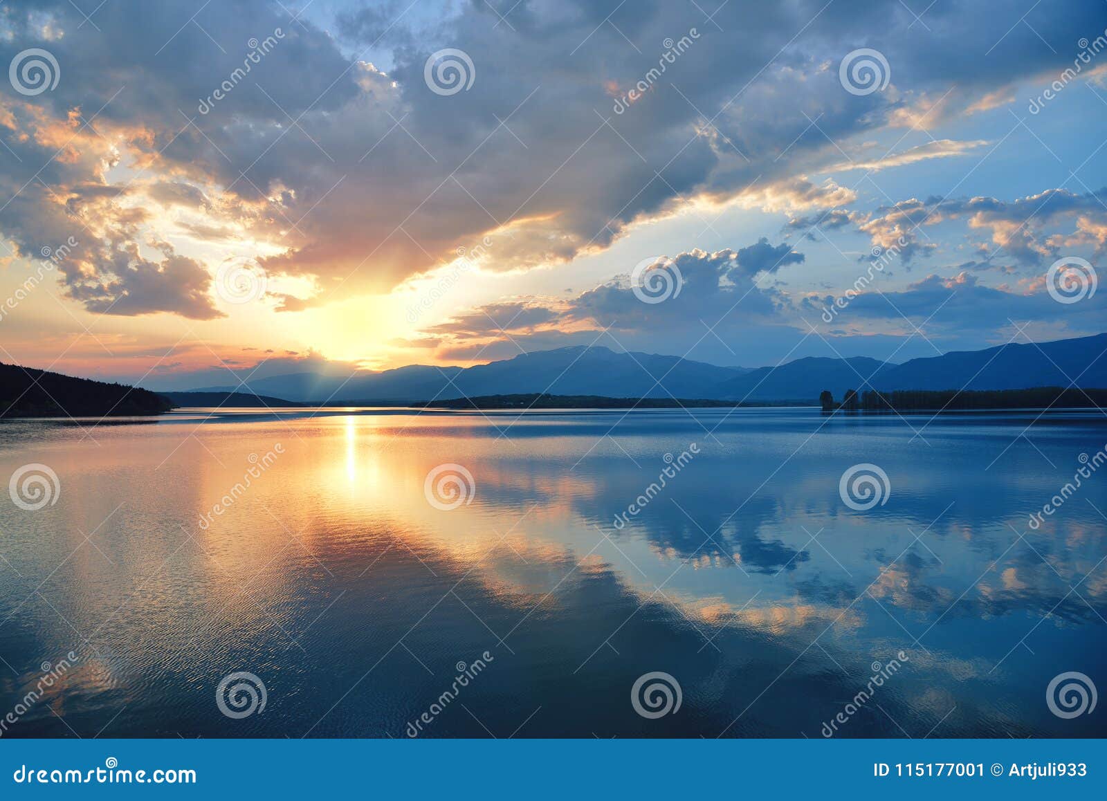 sunset,sunrise summer landscape.beautiful nature.blue sky,amazing colorful clouds.natural background.artistic wallpaper.lake,sun.