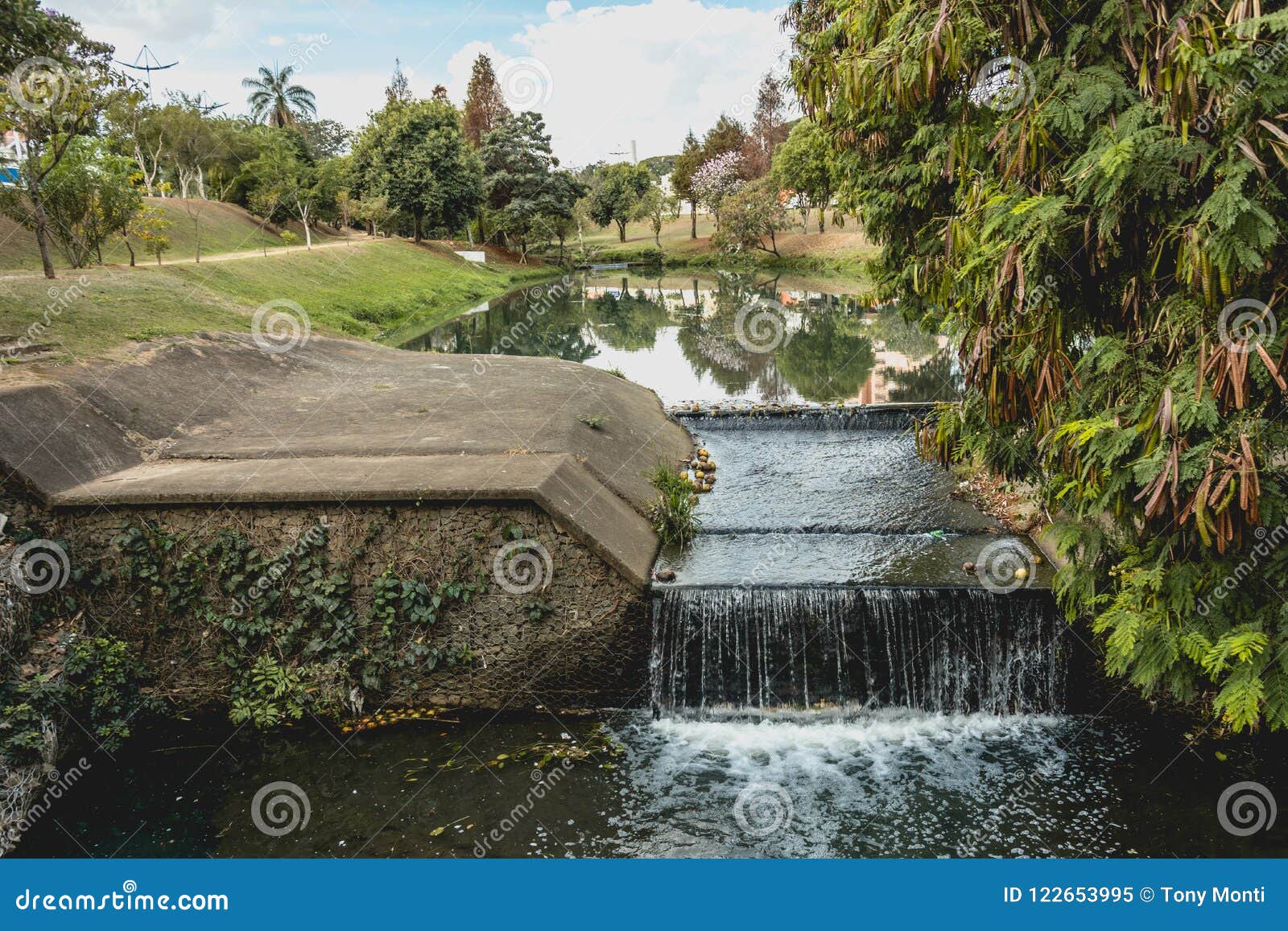 small water fall, along the river, in the ecological park, in in