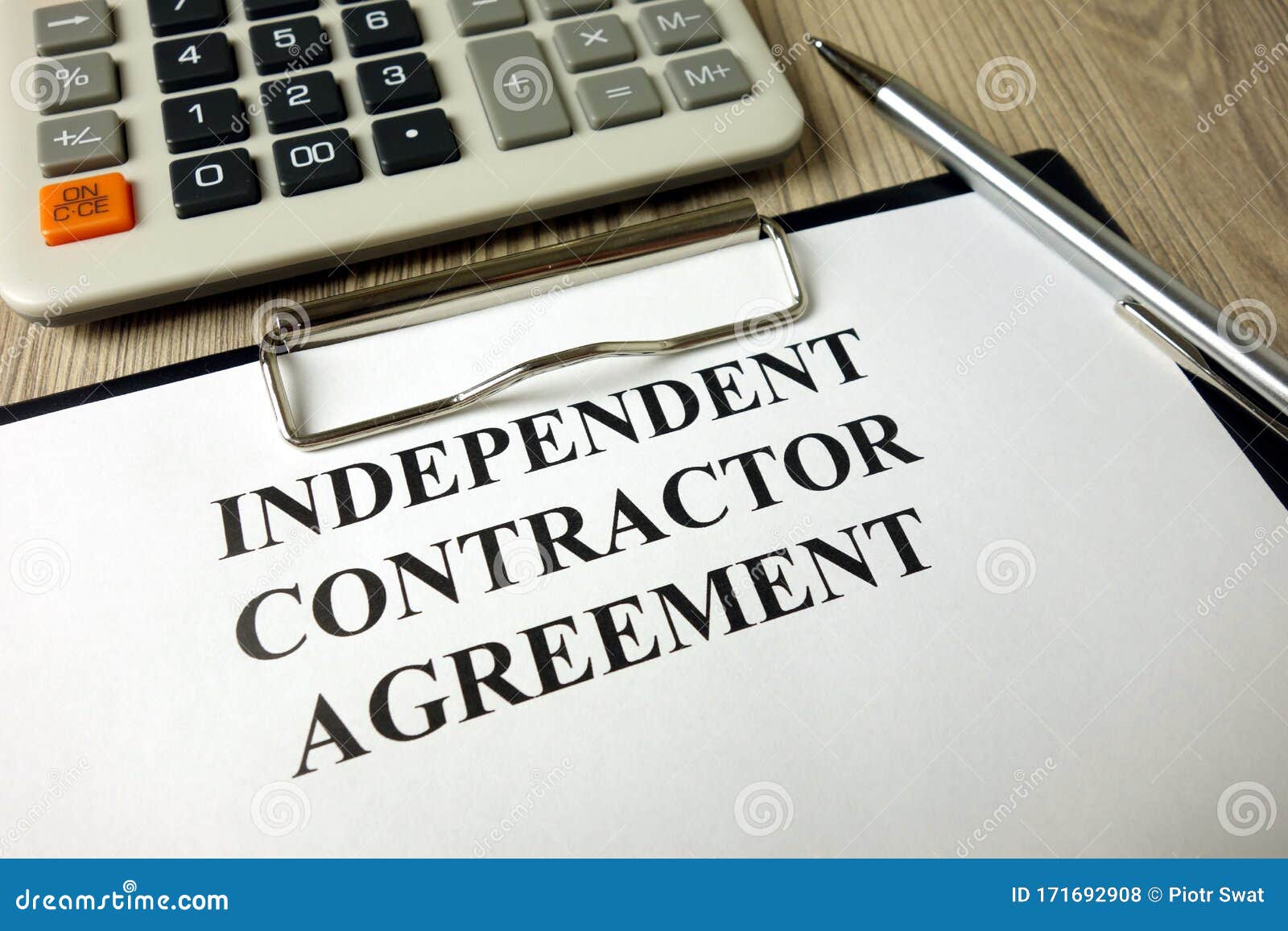 Independent Contractor Agreement With Calculator And Pen Stock Photo Image Of Compensation Finance Independent Contractor Agreement With Calculator And Pen Stock Photo Image Of Compensation Finance