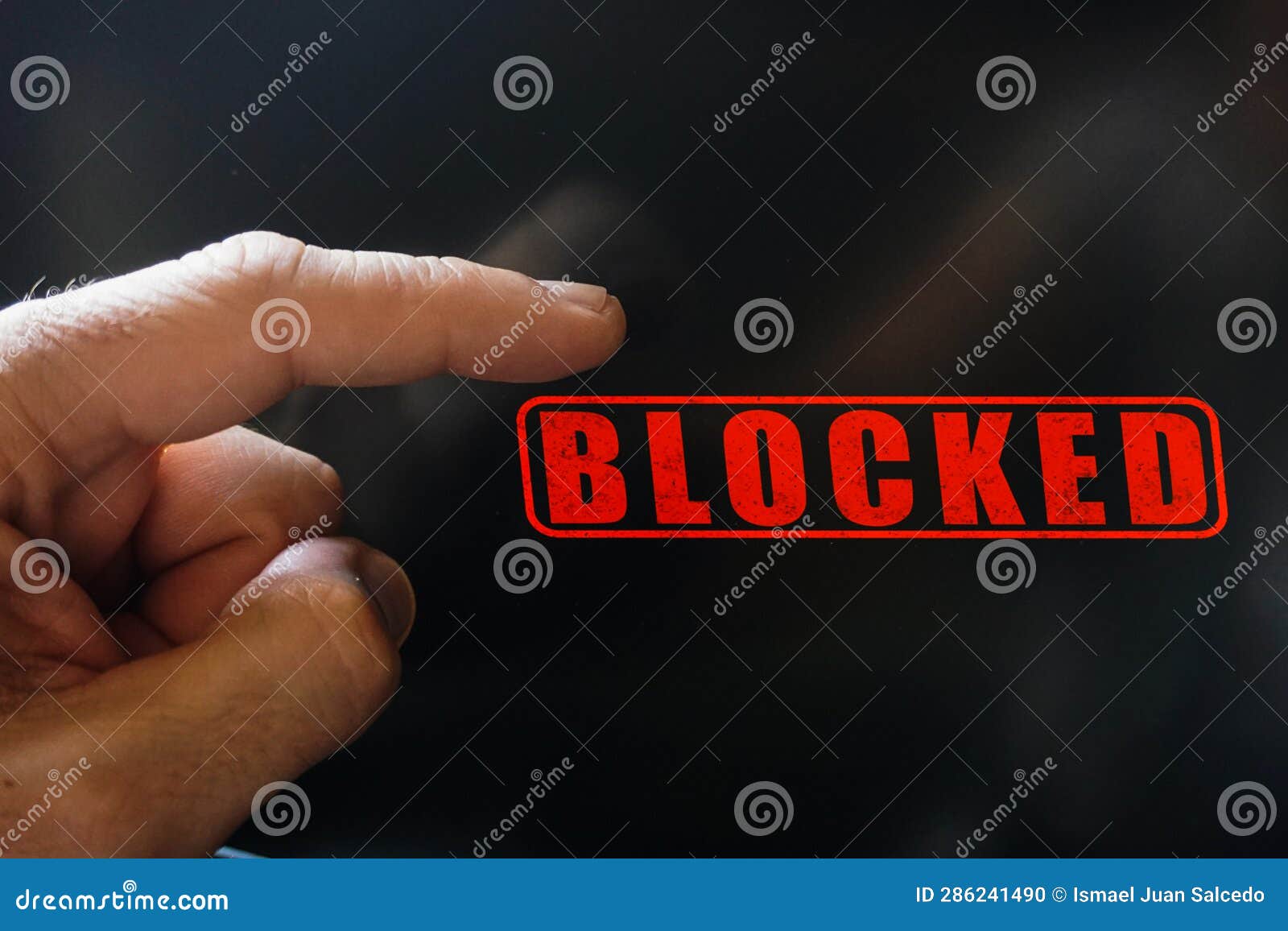 Index Finger Pointing at a Locked Digital Screen Stock Photo Image of