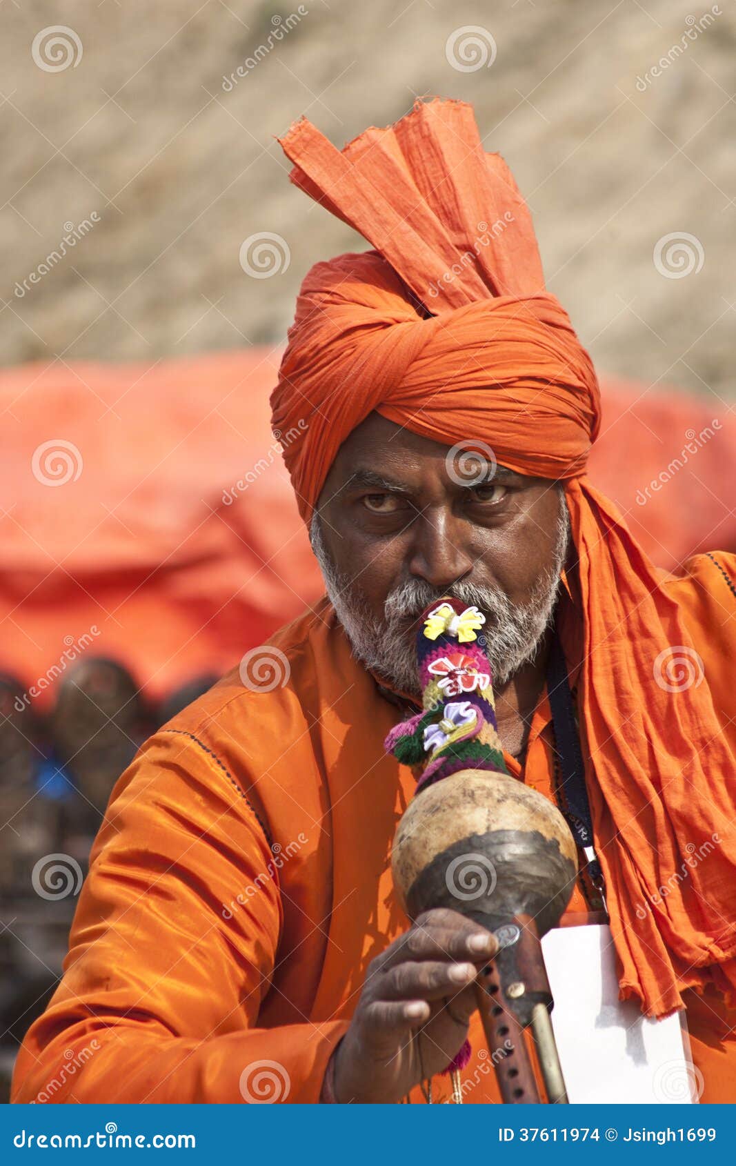 An Indian Artist Playing Flute Editorial Stock Image Image of expressions, color 37611974