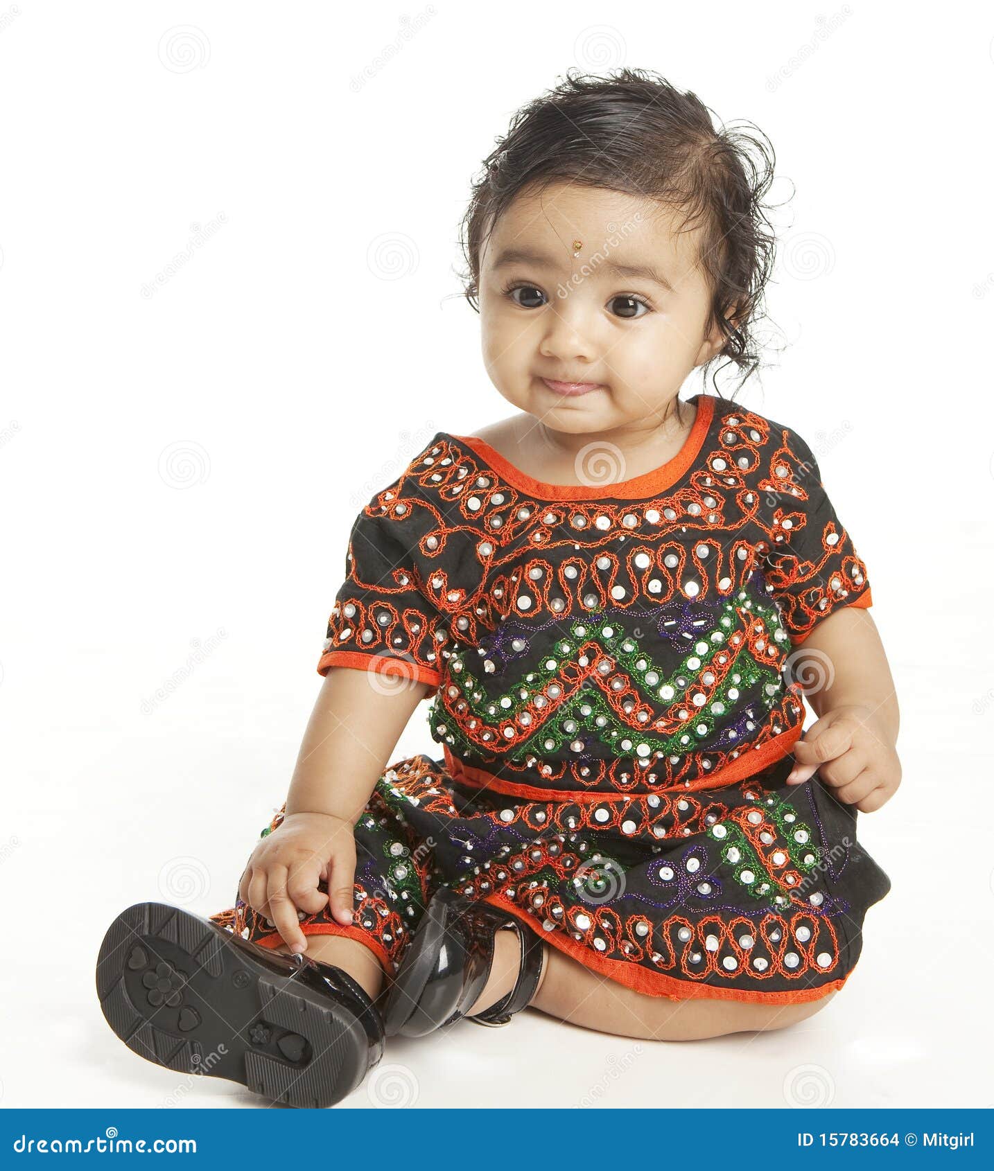baby girl in traditional dress