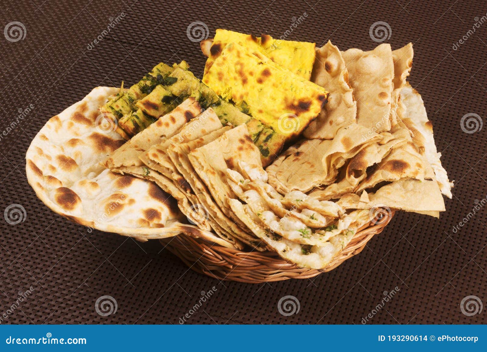 Indian Bread Paratha With Chickpea Curry And Sweet Rasgulla Served With