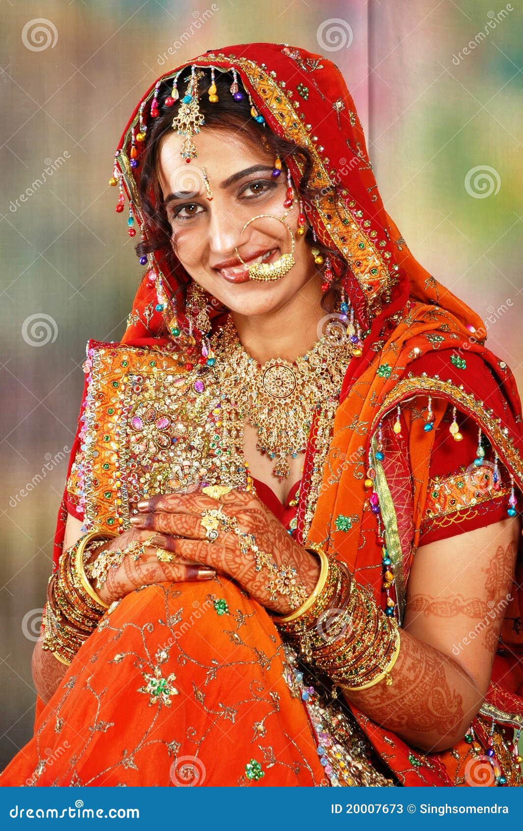 Indian Bride in Her Wedding Dress Showing Stock Image - Image of ...