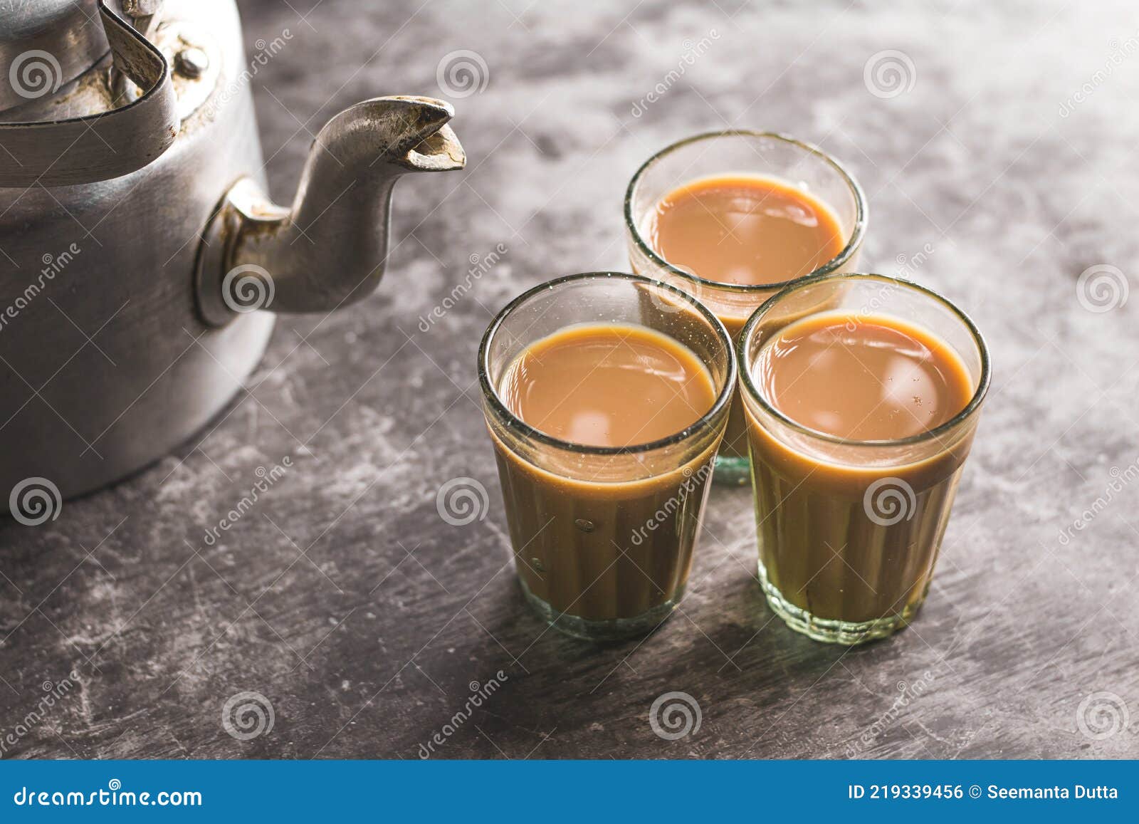 Indian chai in glass cups with masalas to make the tea. Stock