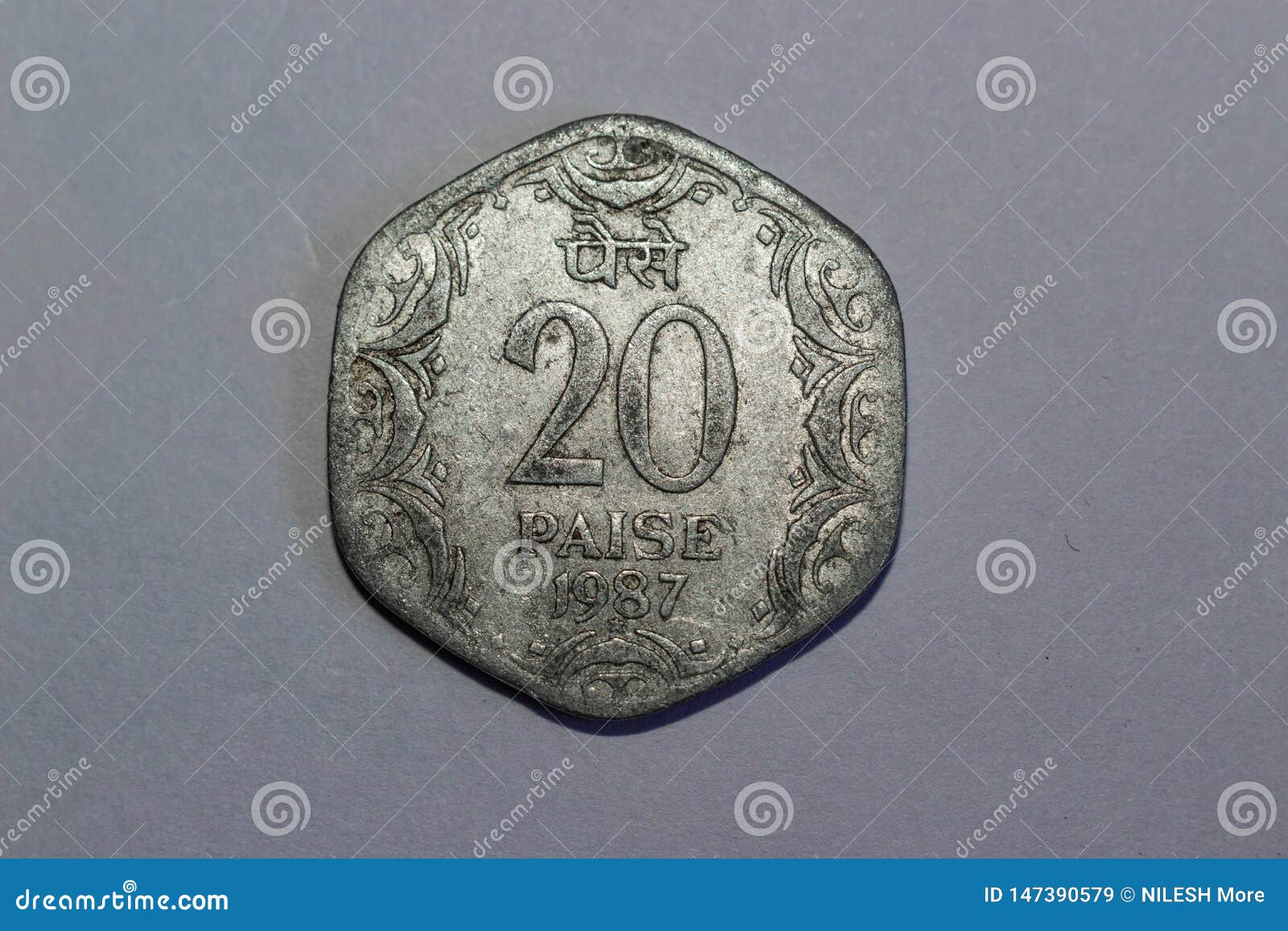 indian 20 paisa silver colour coin head side