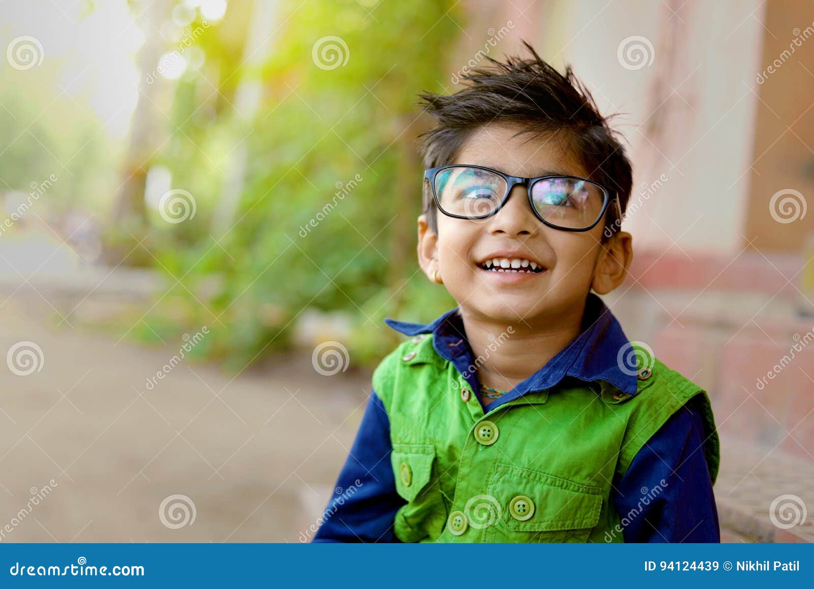 indian child wearing eyeglasses