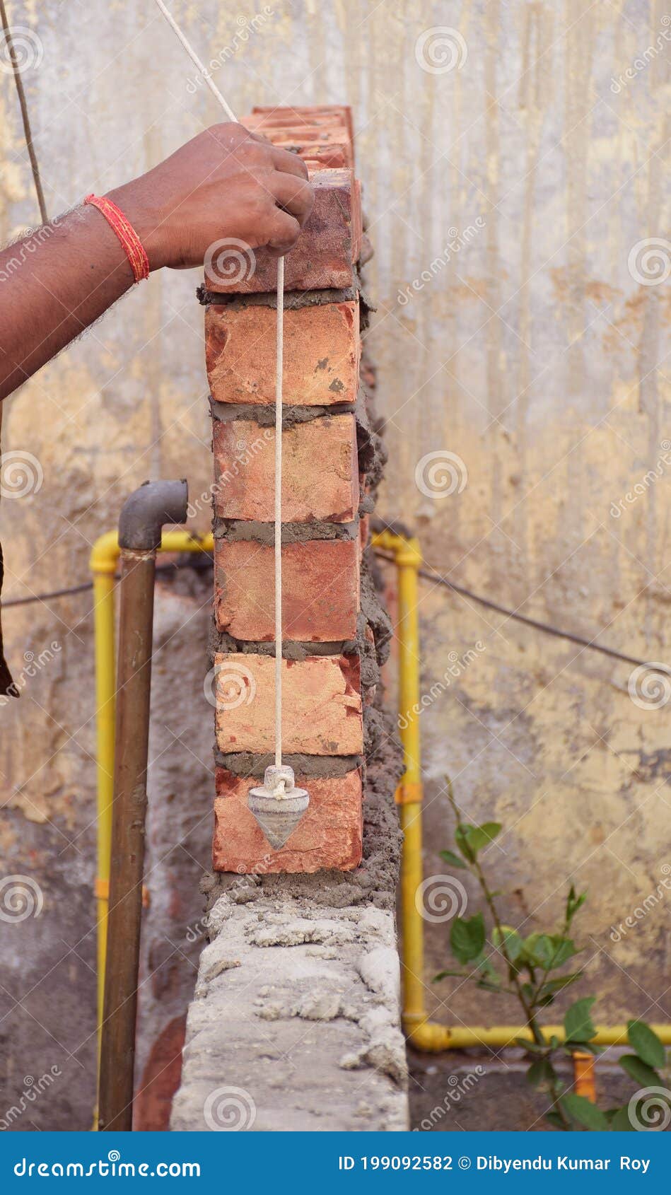 Indian Construction Worker Using Construction Tool Stock Photo Image of mistry, outdoors