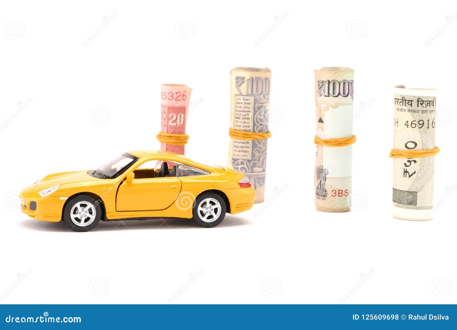 indian currency notes and toy car in the hands bank loan concept