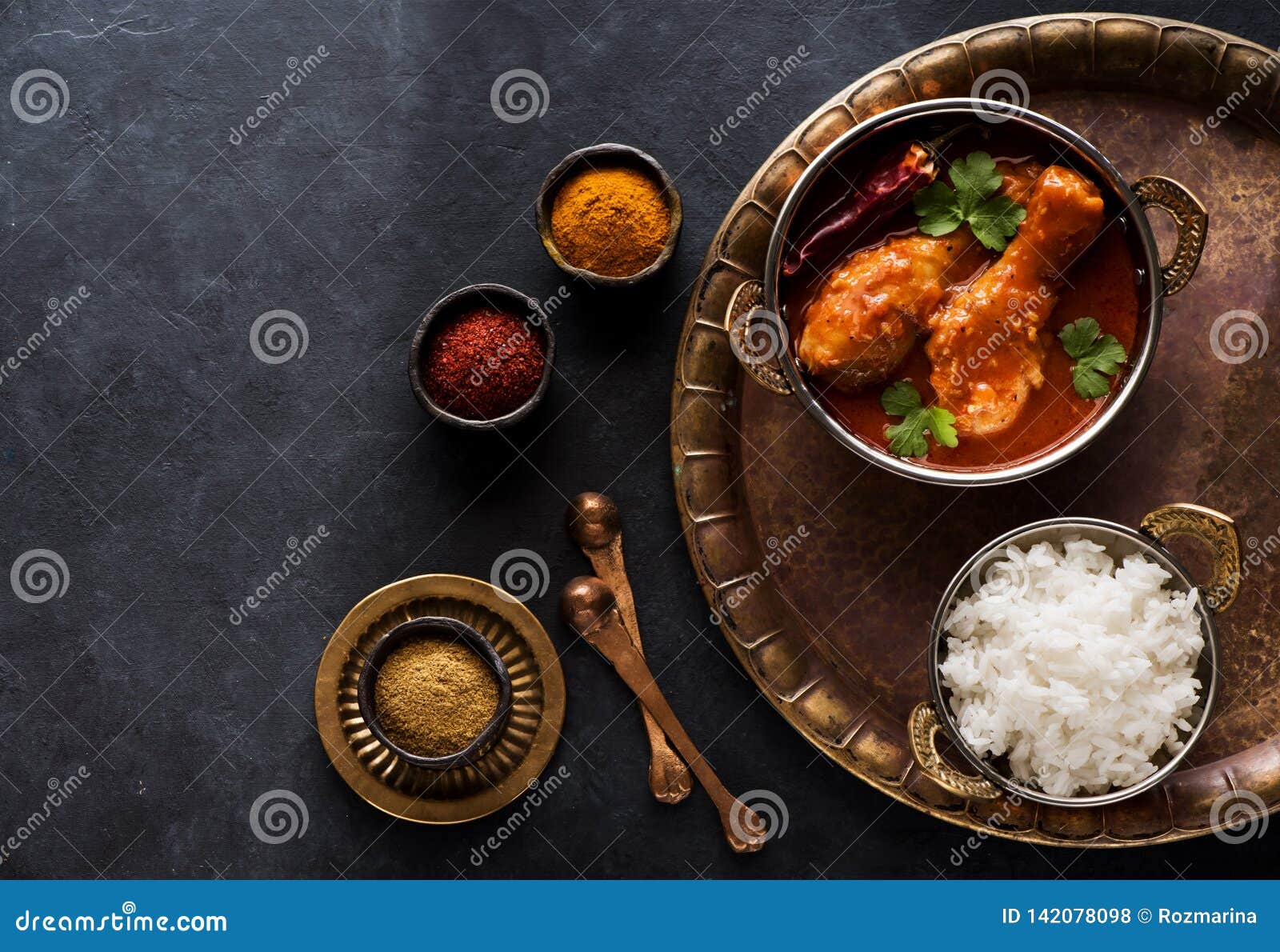 Spicy Chicken Legs with Rice. Indian Dish Chicken Spicy Curry Masala