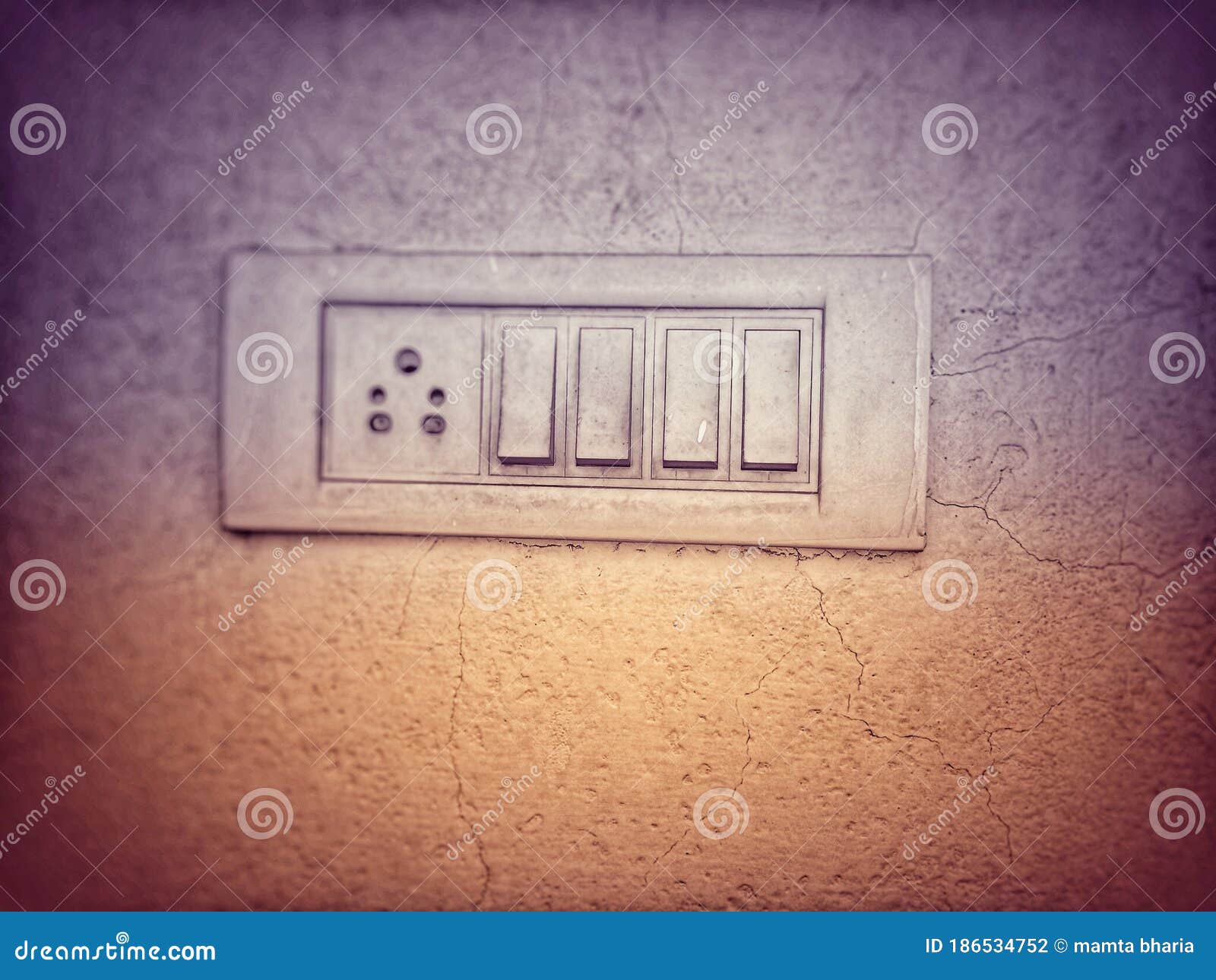 Indian Electric Switch with Four Buttons and a Plug Stock Photo Image