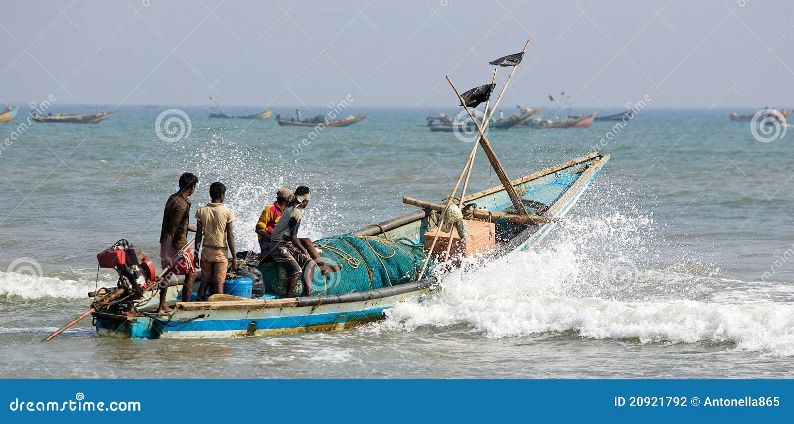 Indian fisherman and boat editorial photography. Image of boat