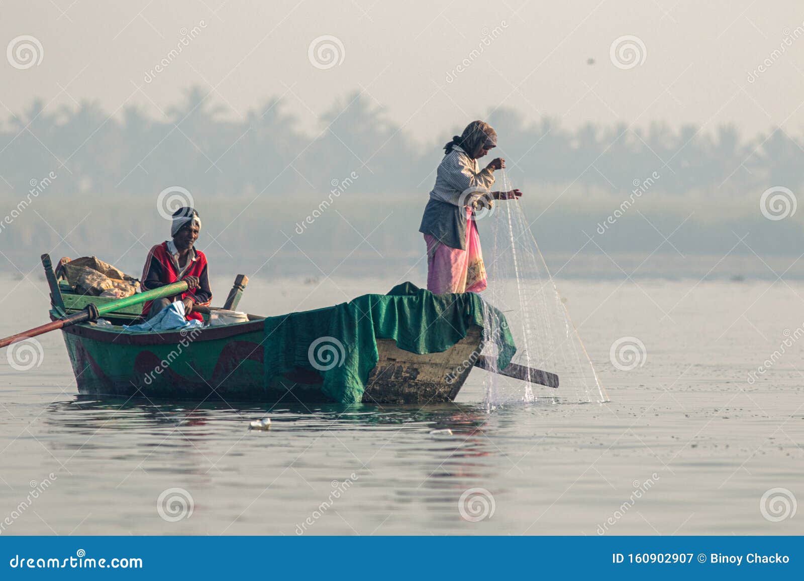 Indian fishing in a lake editorial photography. Image of asia - 160902907