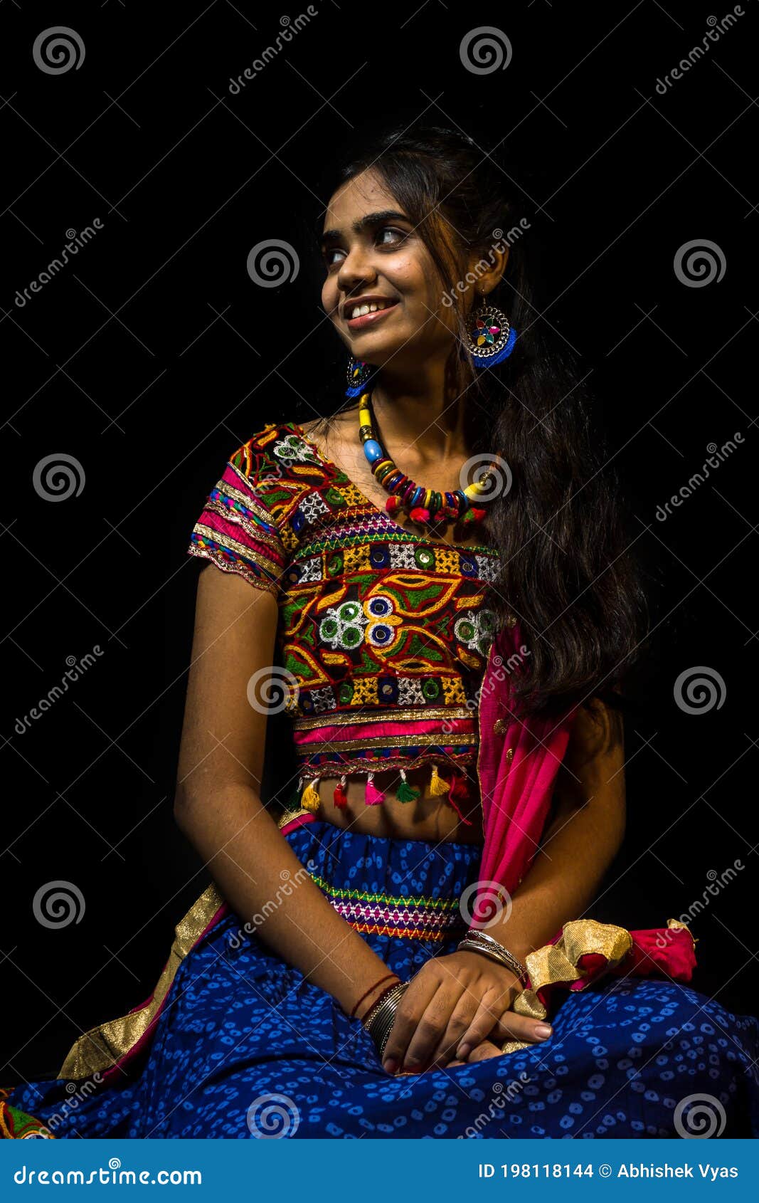 Image of Beautiful Indian young girl posing in traditional Indian saree on  white background.-WJ107404-Picxy