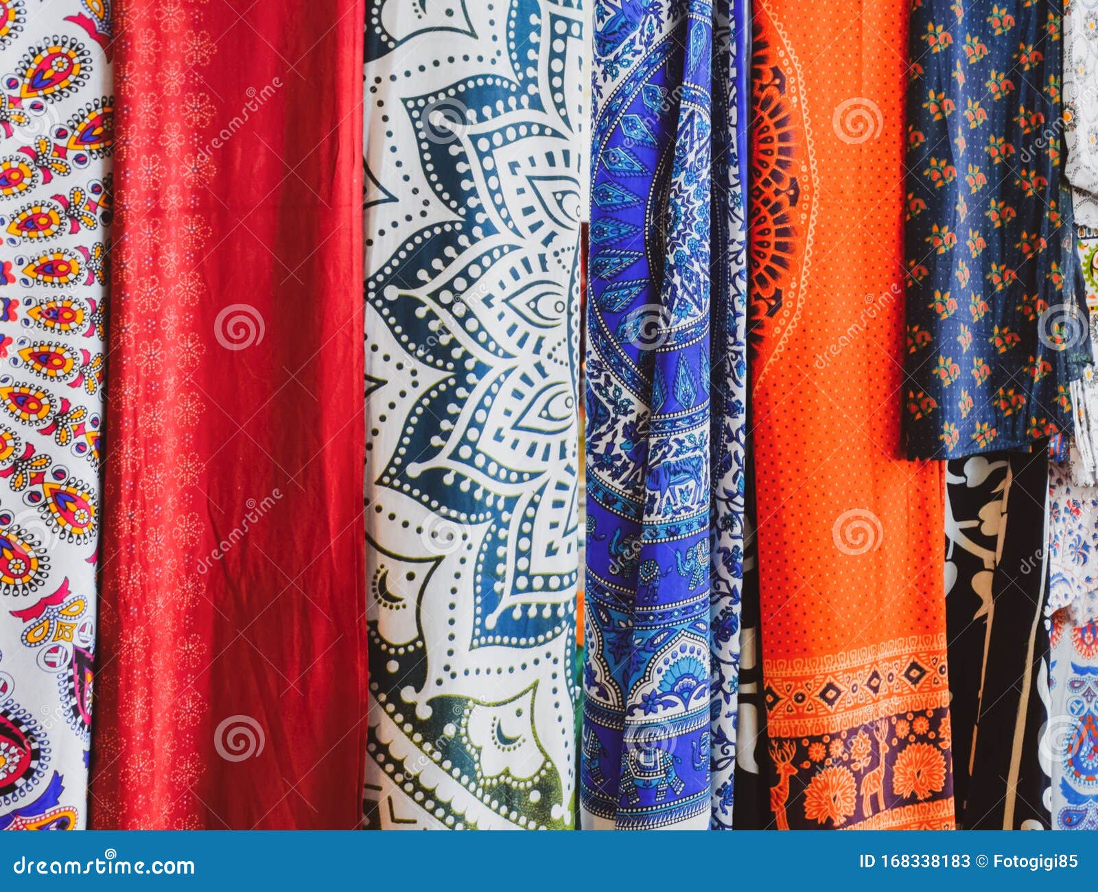 Indian Hanging on the Counter. Trade in Fabrics from India. Fabric with