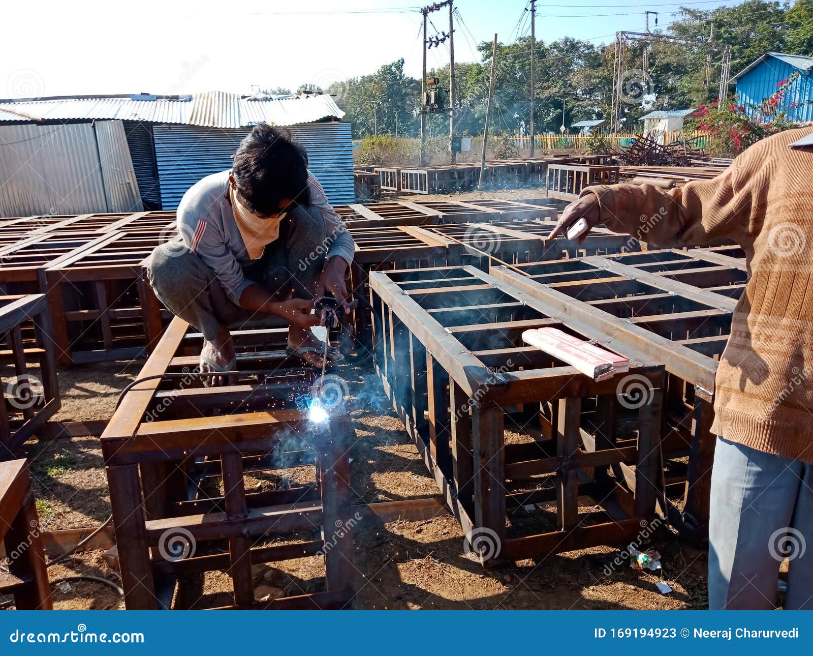 An Indian Labour Welding on Iron Structure during Indian Railway Bridge