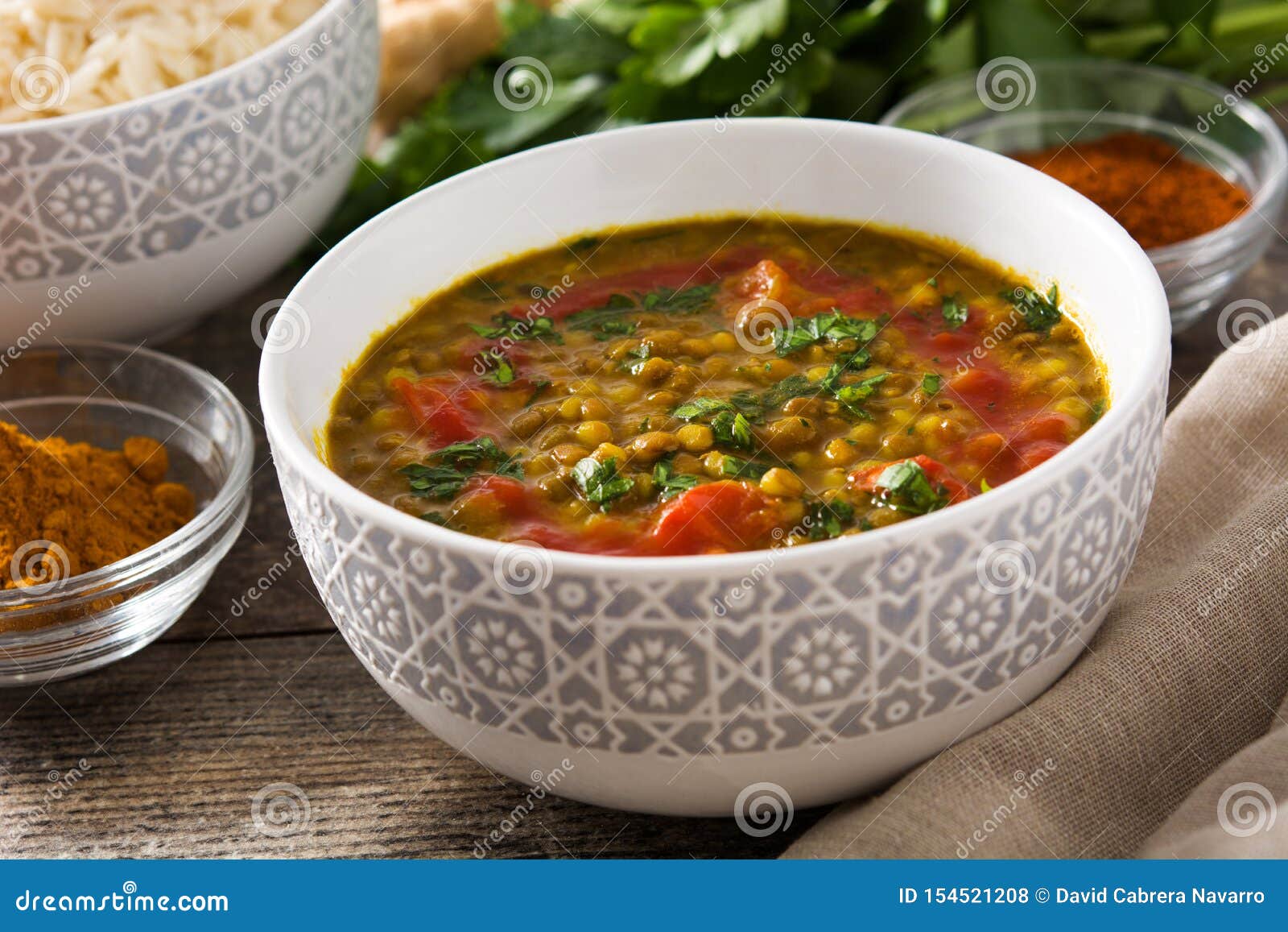 Indian Lentil Soup Dal Dhal in a Bowl on Wood Stock Photo - Image of ...