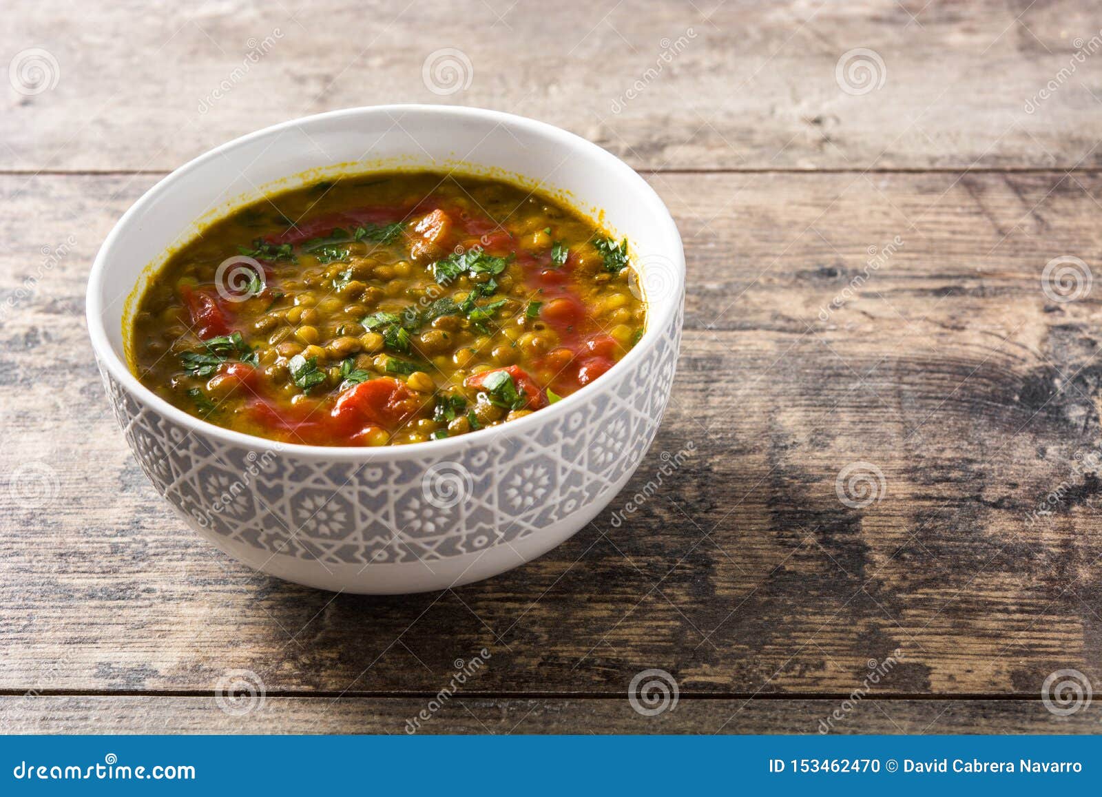 Indian Lentil Soup Dal Dhal in a Bowl on Wooden Table. Stock Photo ...