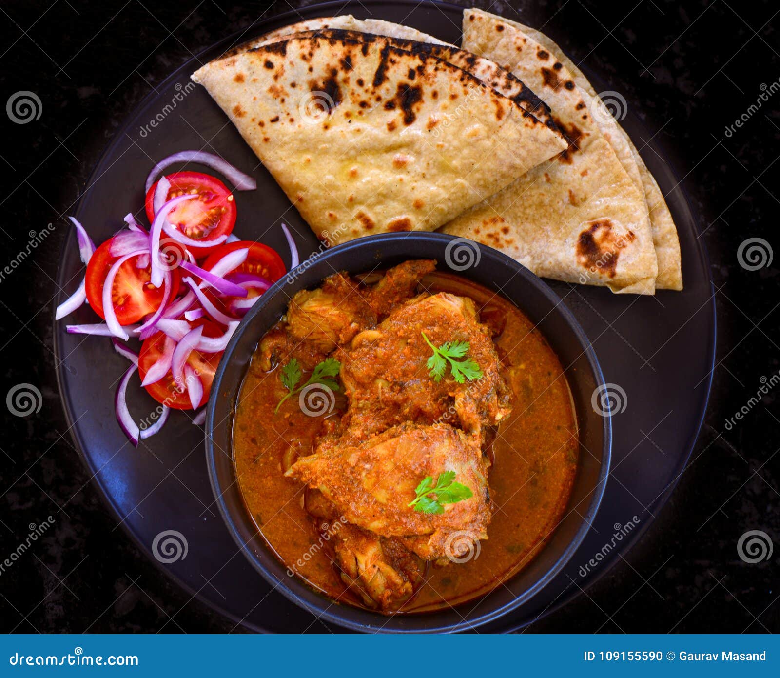 Indian Meal Chicken Curry and Roti Indian Flatbread Stock Photo Indian Meal Chicken Curry and Roti Indian Flatbread Stock Photo