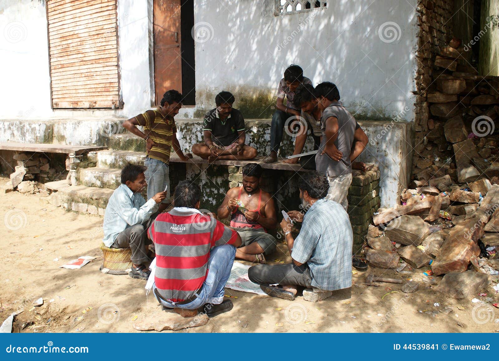 Indian men playing cards editorial photo. Image of sitting 