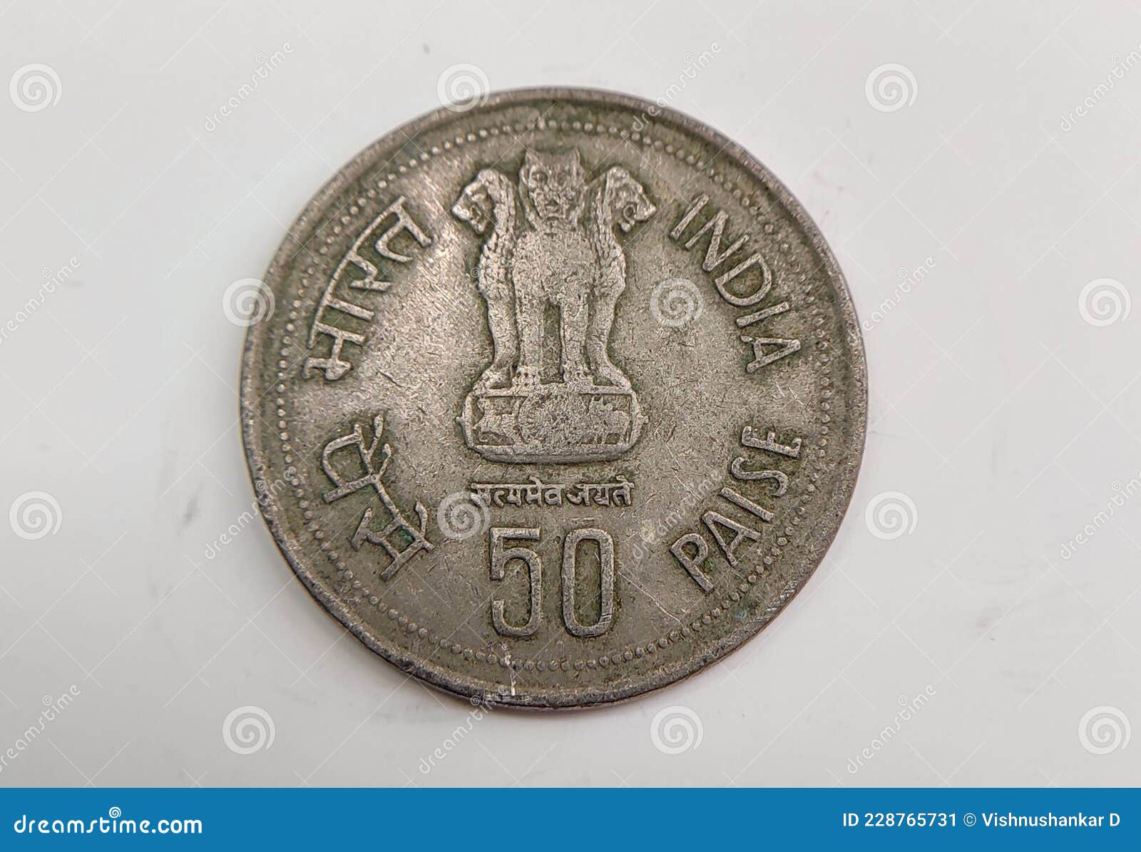 Indian Old 50 Paise Coin with Ashoka Chakra on the Front Side Editorial ...