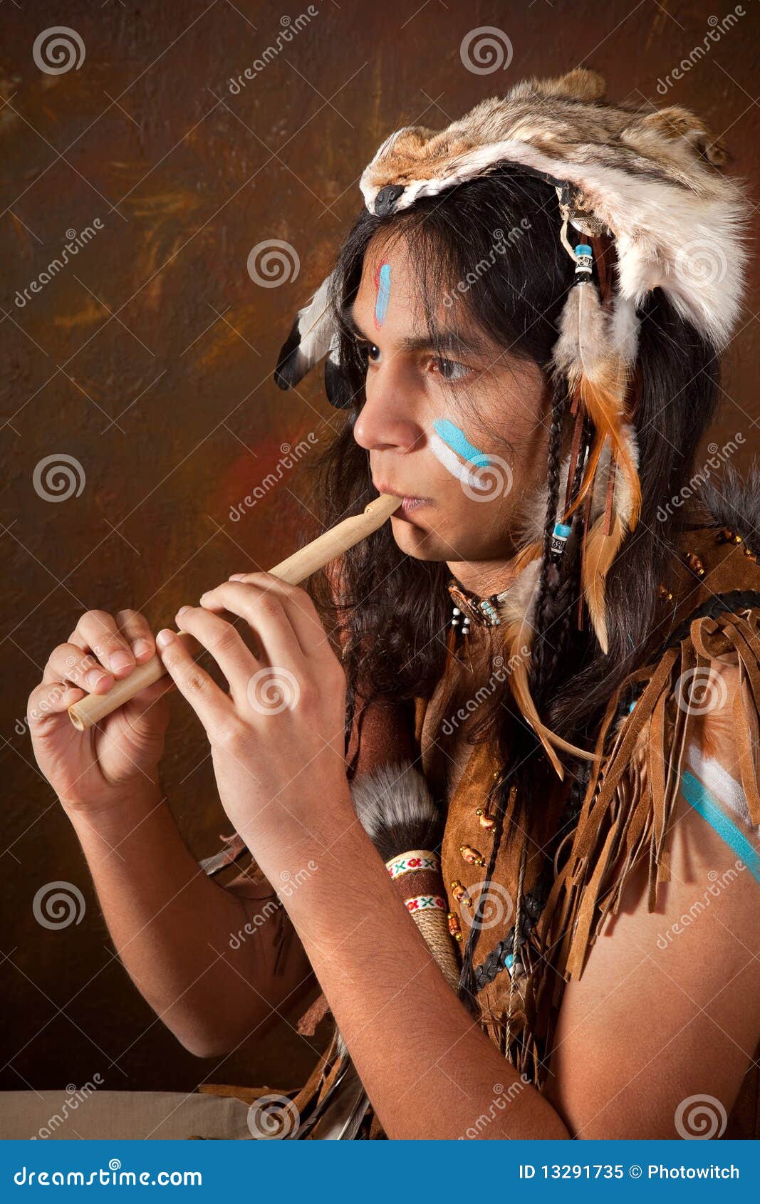 Indian playing the flute stock image. Image of warrior 13291735