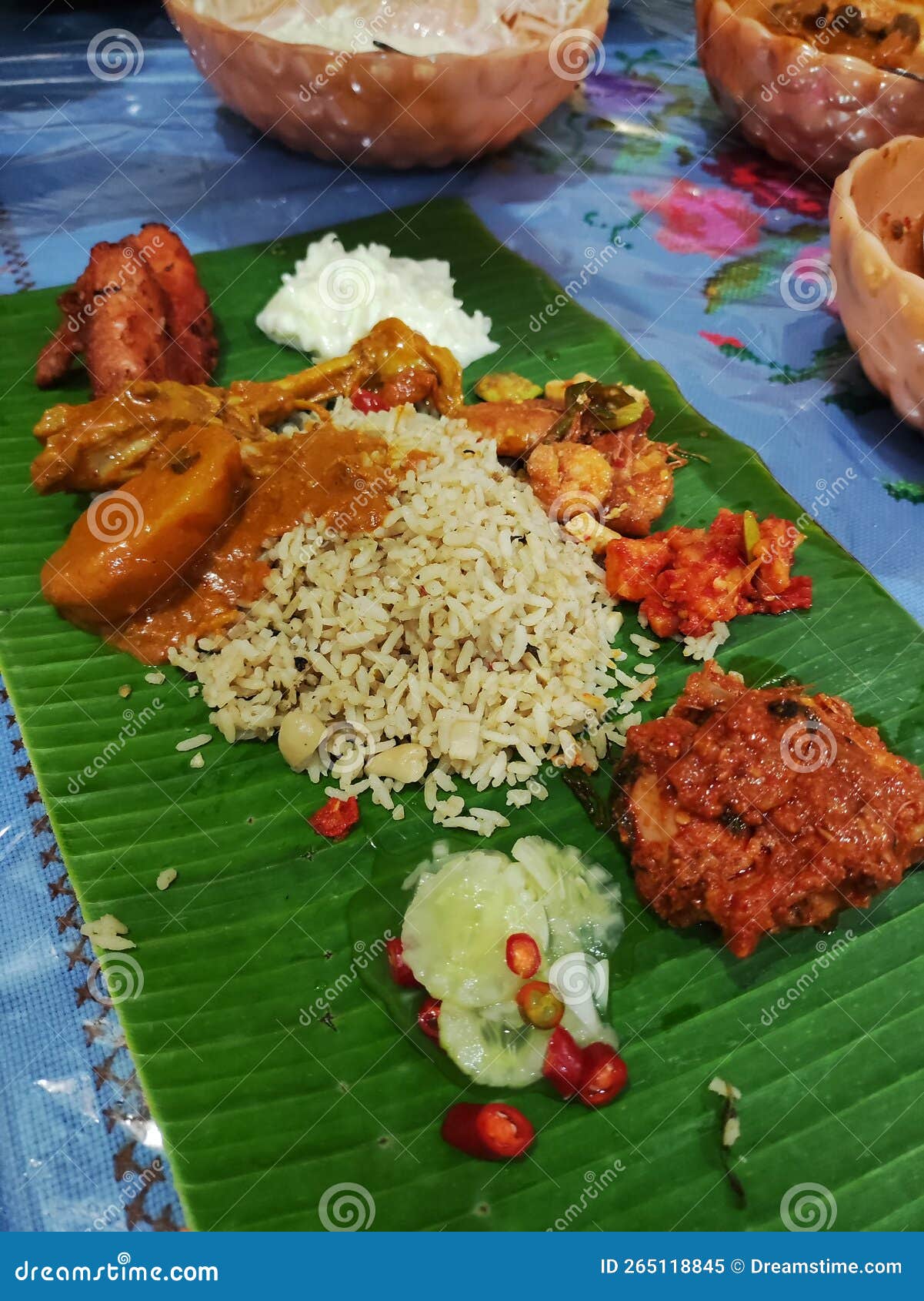 Indian Rice Serve with Chicken, Shrimp, Curd and Pickles Stock Image