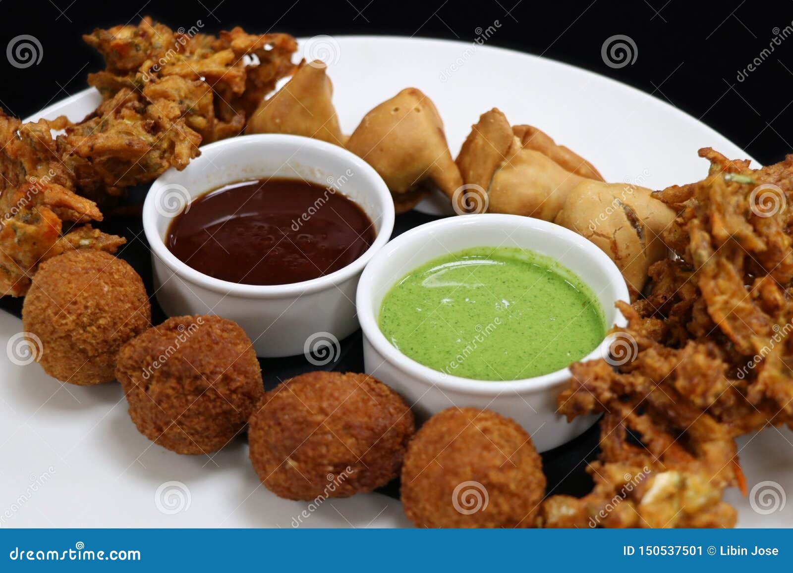 Indian Snack Pakora Plater With Mint And Tamarind Sauce Stock Image Image Of Food Accompaniment Indian Snack Pakora Plater With Mint And Tamarind Sauce Stock Image Image Of Food Accompaniment