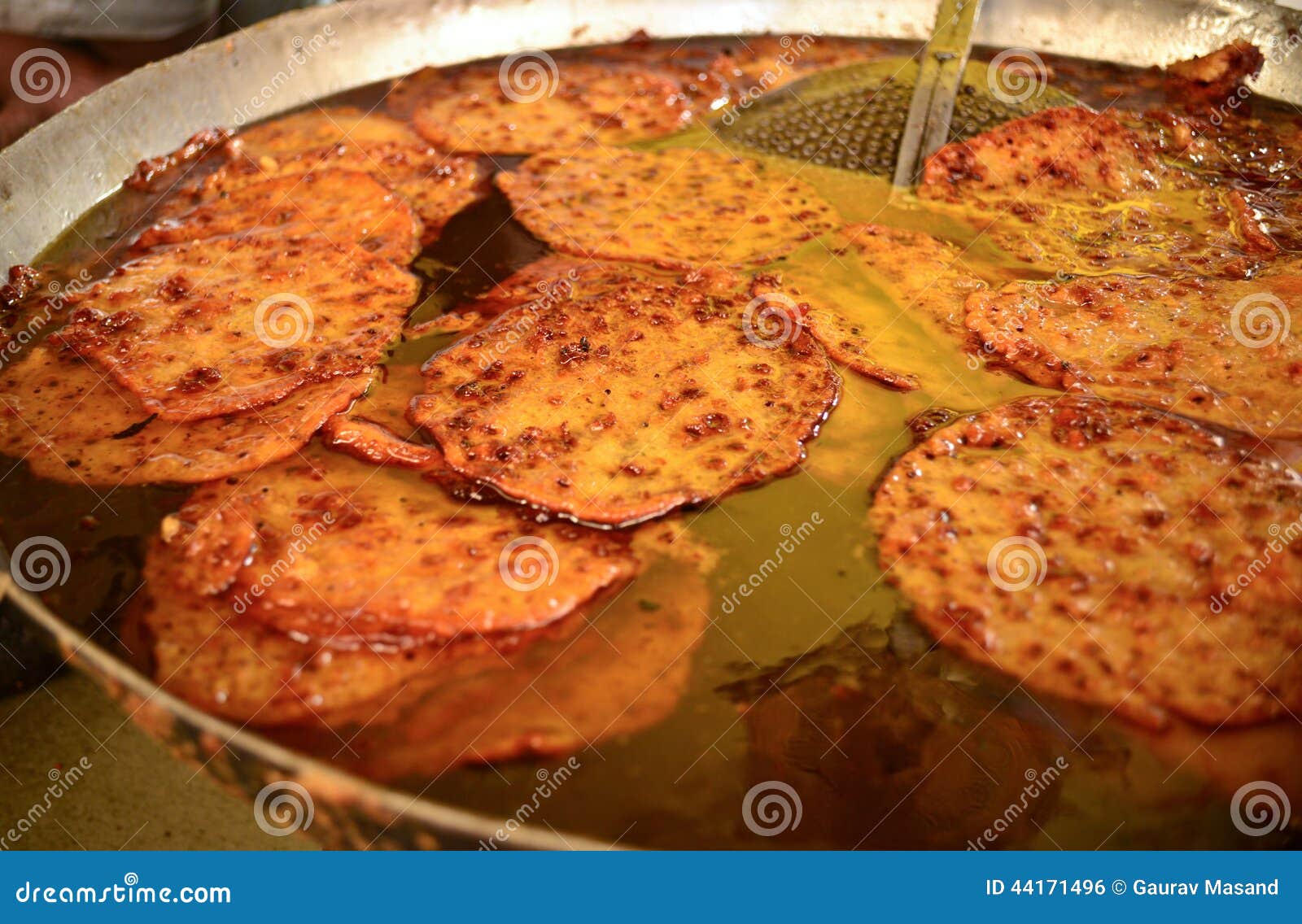 Indian Traditional Sweet Named Malpua Cooking in Hot Oil in Kadai (Frying  Pan). This Delicious Dessert is Famous in Ajmer - Rajasthan, India. Stock  Photo