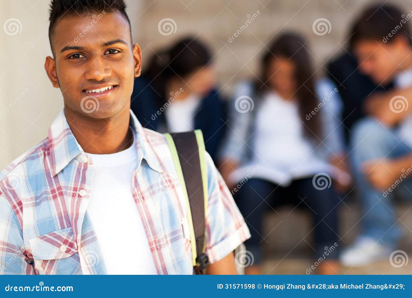 Profile of a Teenage Indian Boy Looking at outsides Stock Photo