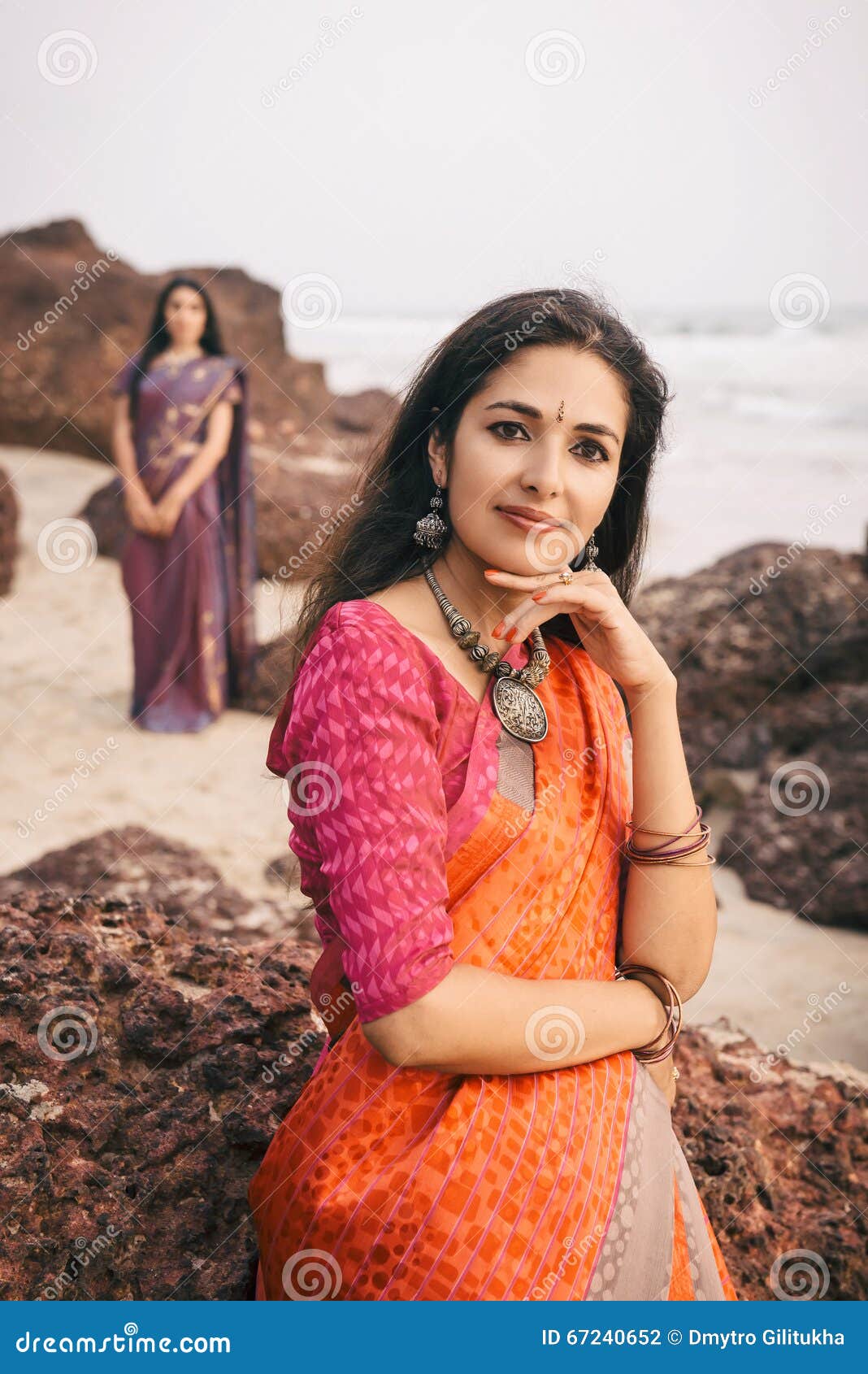 https://thumbs.dreamstime.com/z/indian-woman-beautiful-saree-fashion-shoot-women-traditional-clothes-standing-rock-near-beach-67240652.jpg