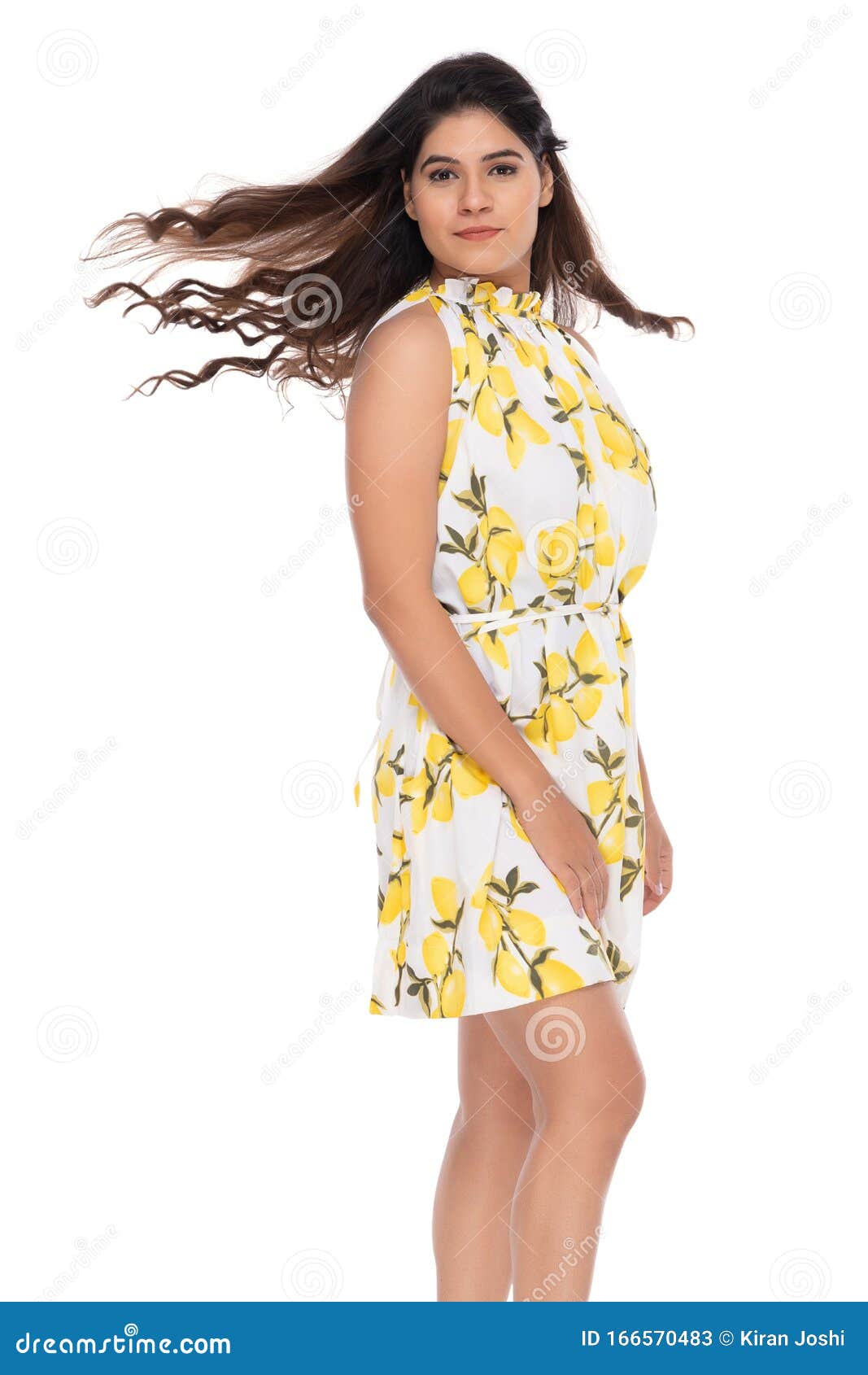 Indian You Girl with Yellow One Piece Dress with Elegant Pose and ...