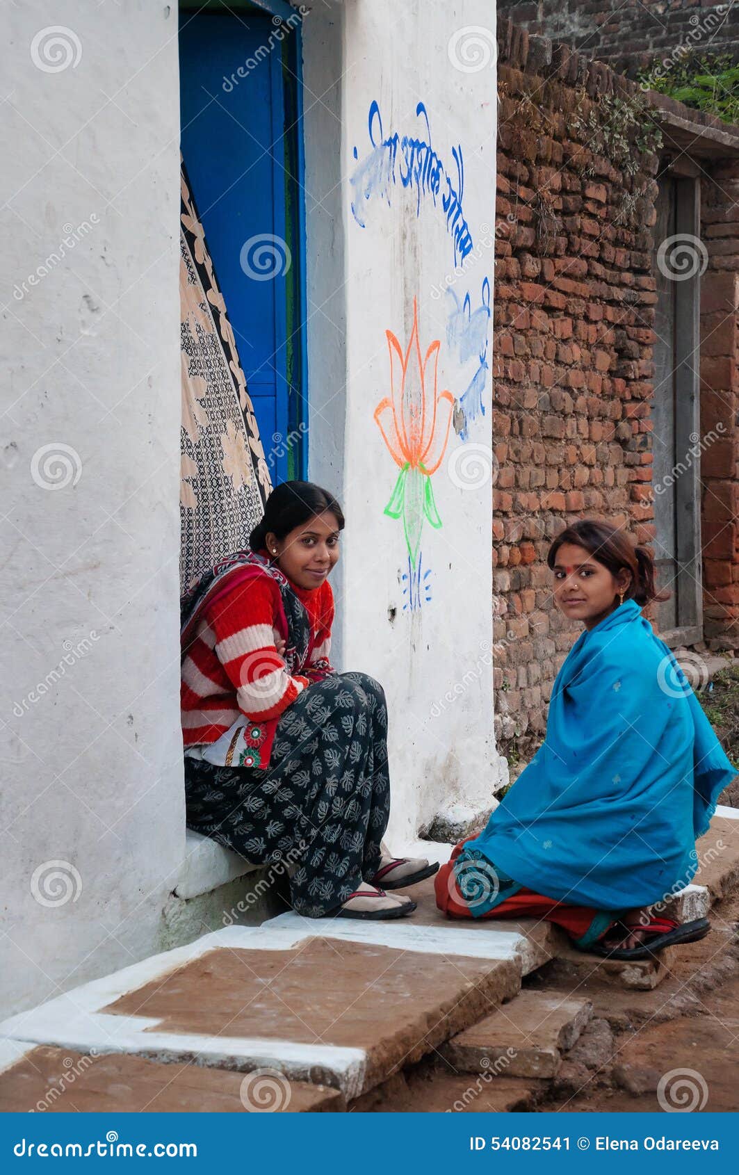  Indian  Young Women Sit And Chat On A House  Porch  Editorial 