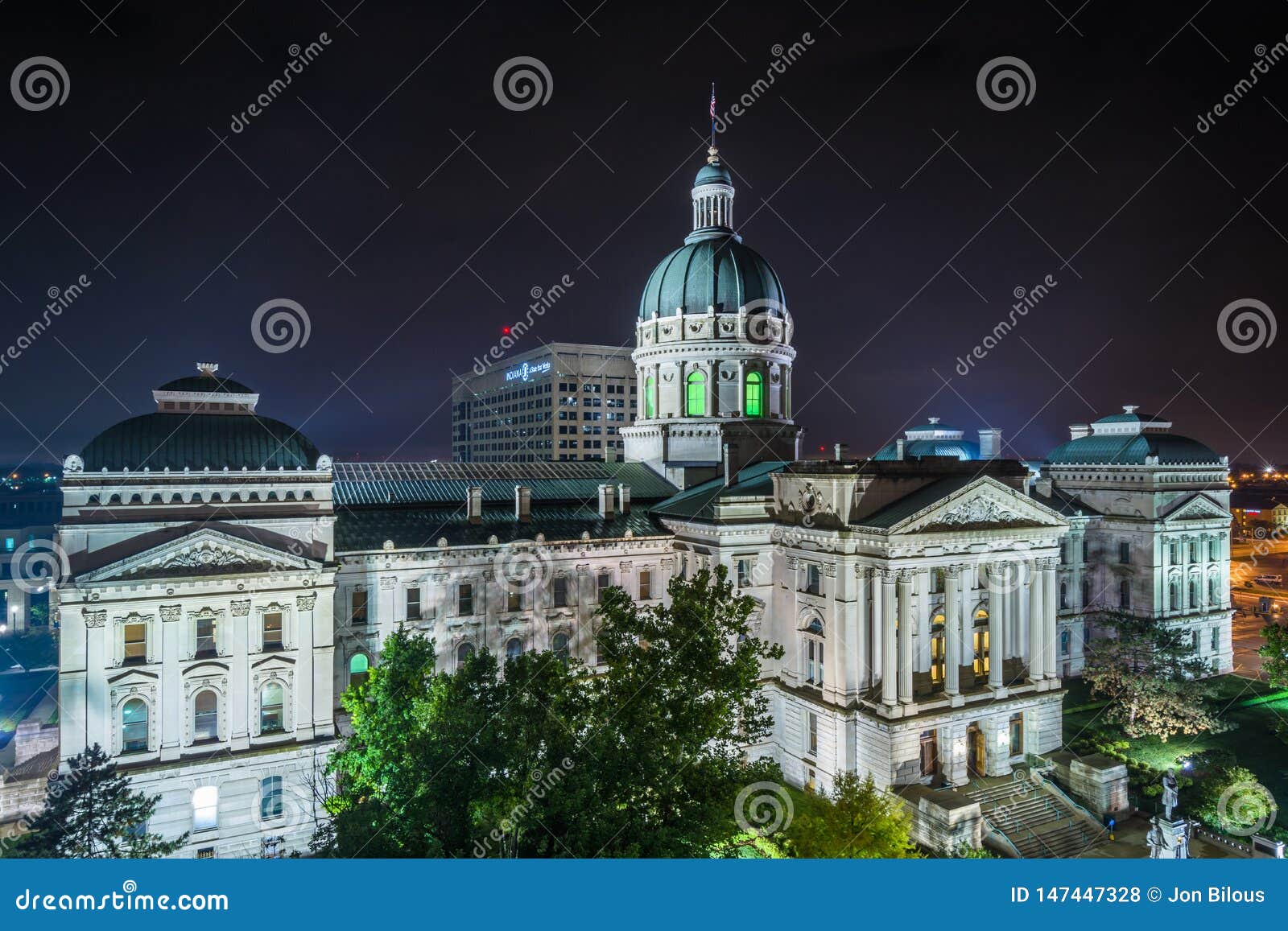 the indiana statehouse at night in indianapolis, indiana