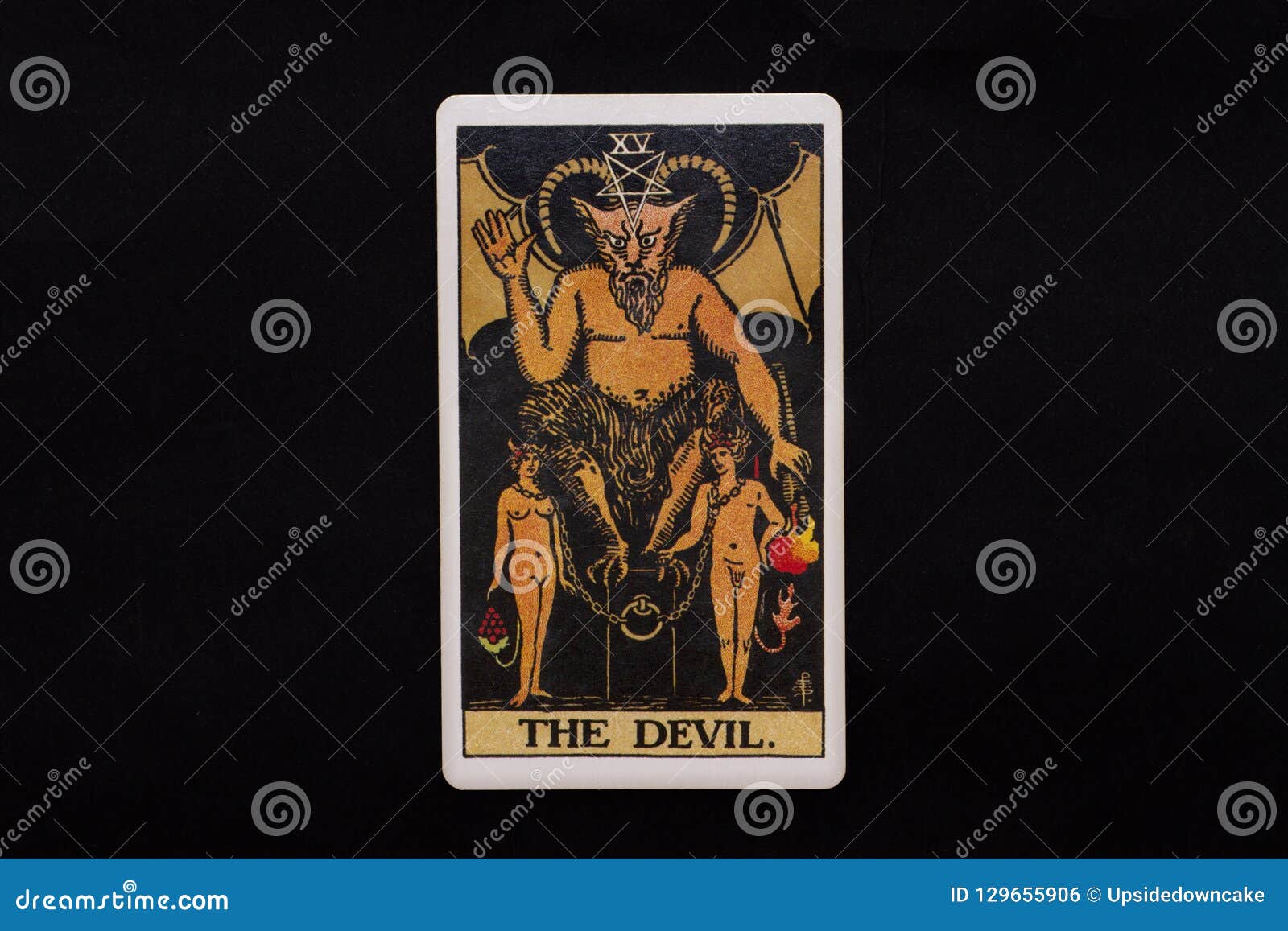 an individual major arcana tarot card  on black background. the devil.