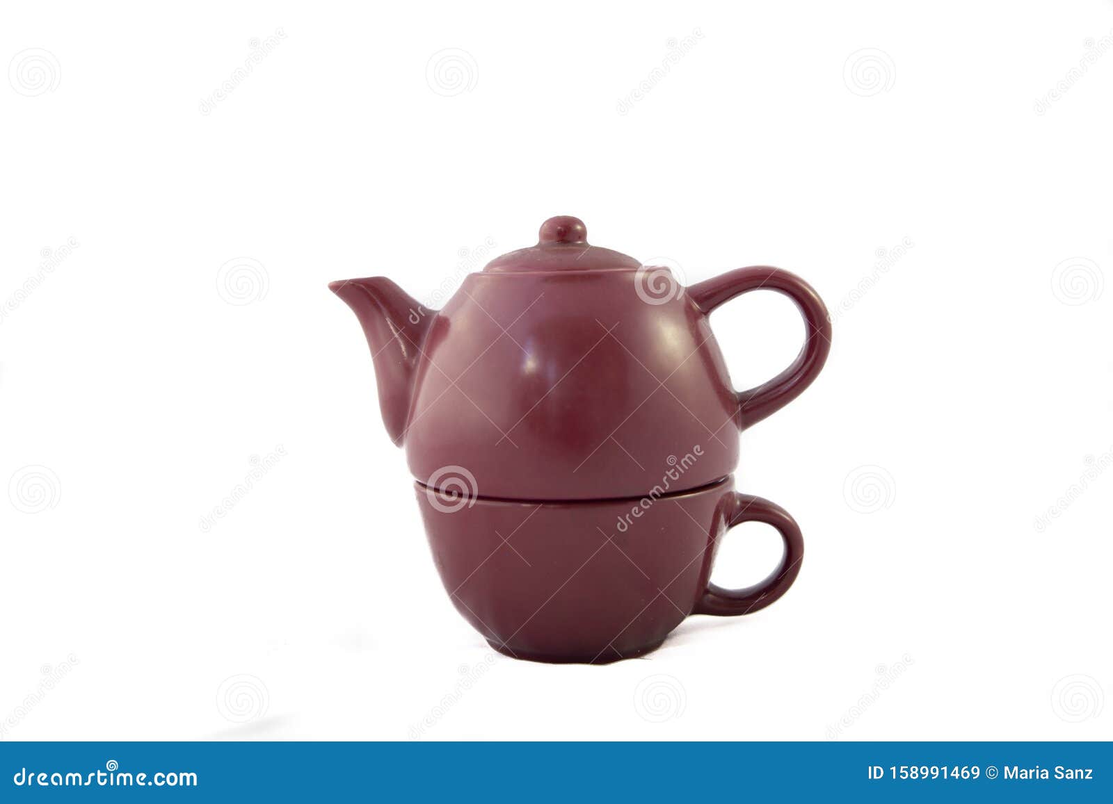 maroon ceramic teapot on white background