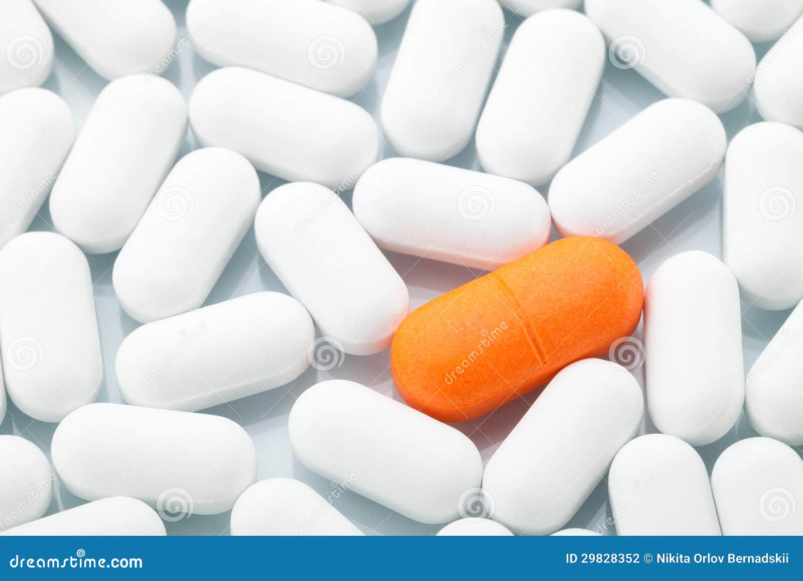 Orange Pill between White Ones Stock Photo Image of antipyretic, drug