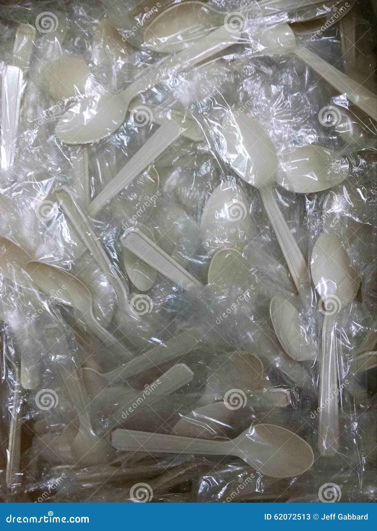 individually wrapped tan plastic spoons