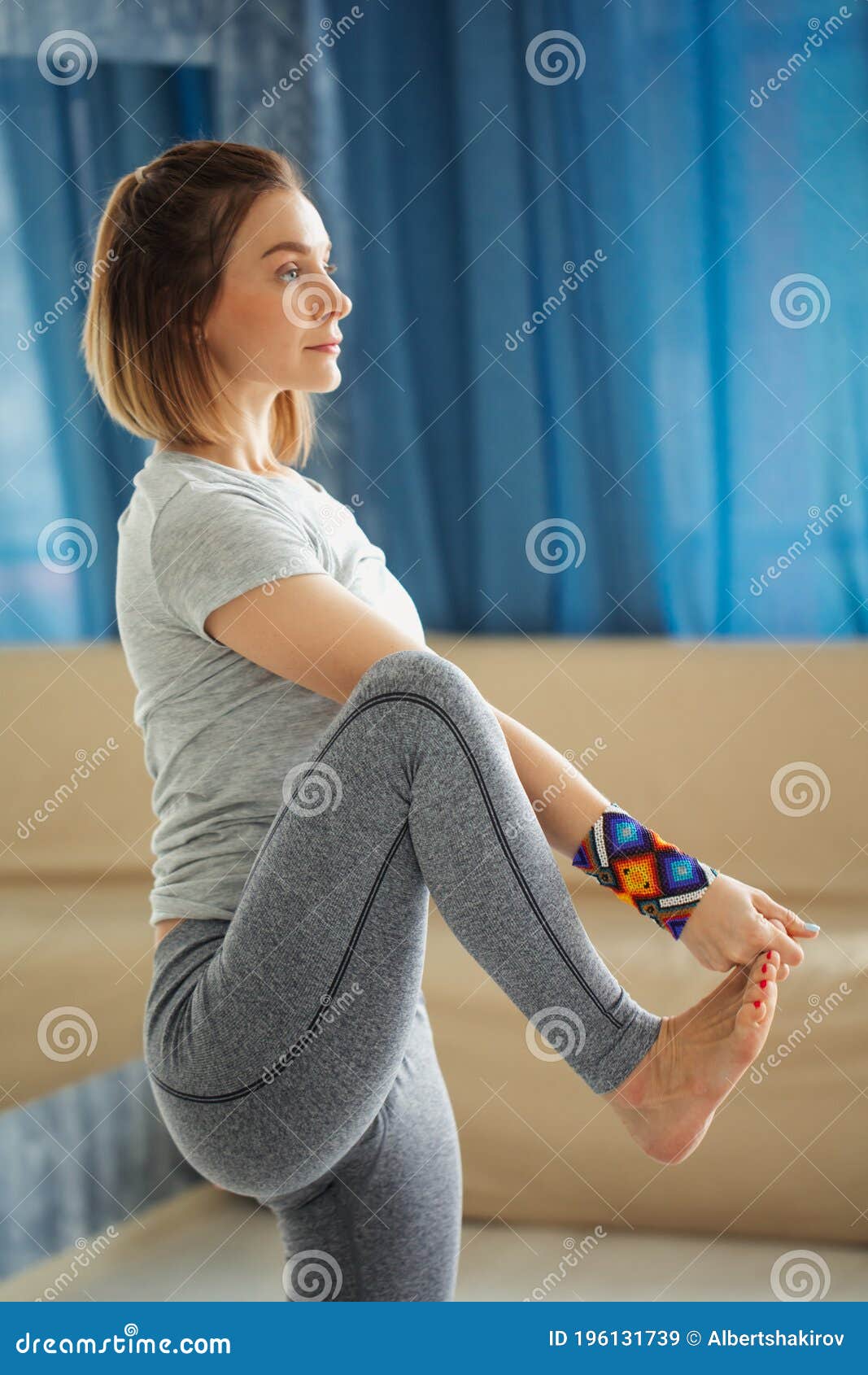 Yoga instructor standing one leg hi-res stock photography and images - Alamy