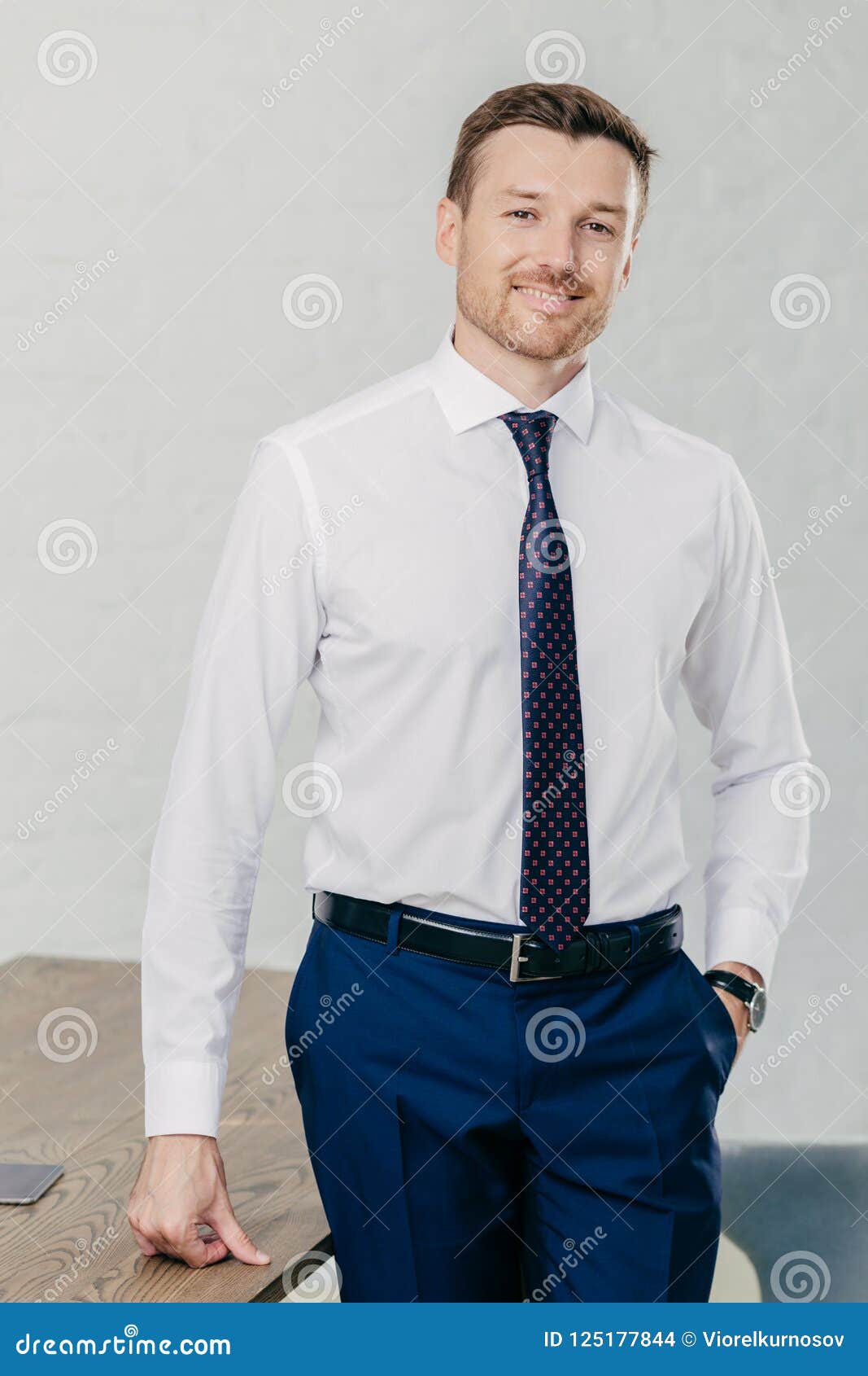 Indoor Shot of Handsome Unshaven Male Entrepreneur Wears Formal Shirt ...