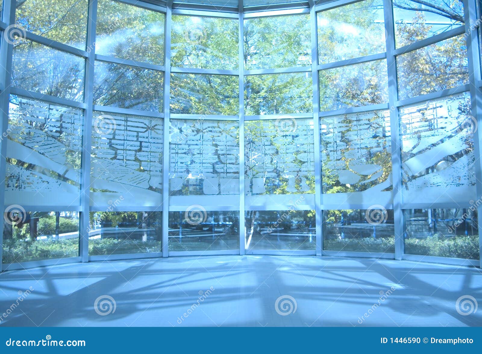 Wall Of Windows With Intricate Carvings Around The Upper Rows Stock