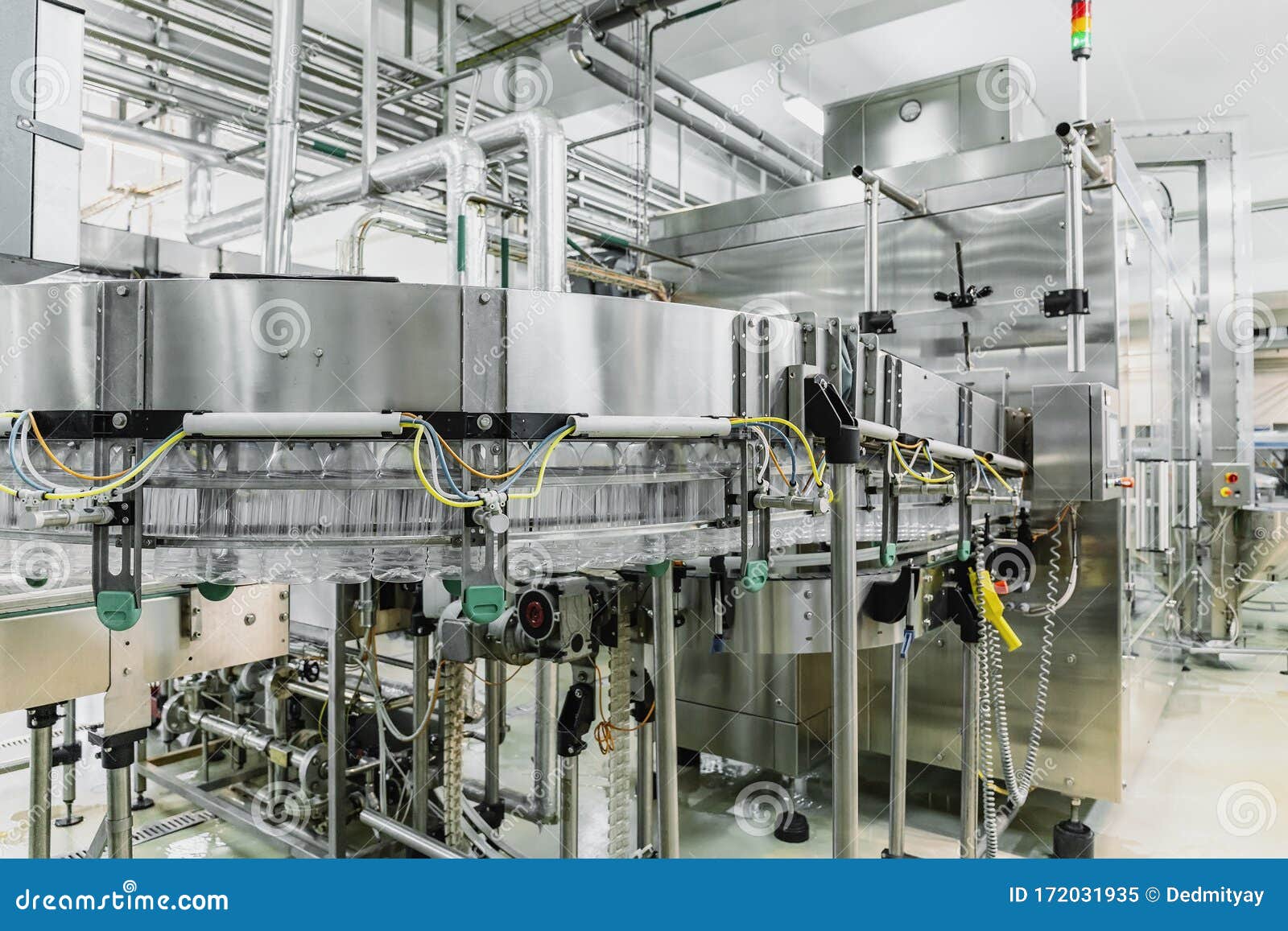 industrial automated machine in beverage plant interior, industry equipment on food factory