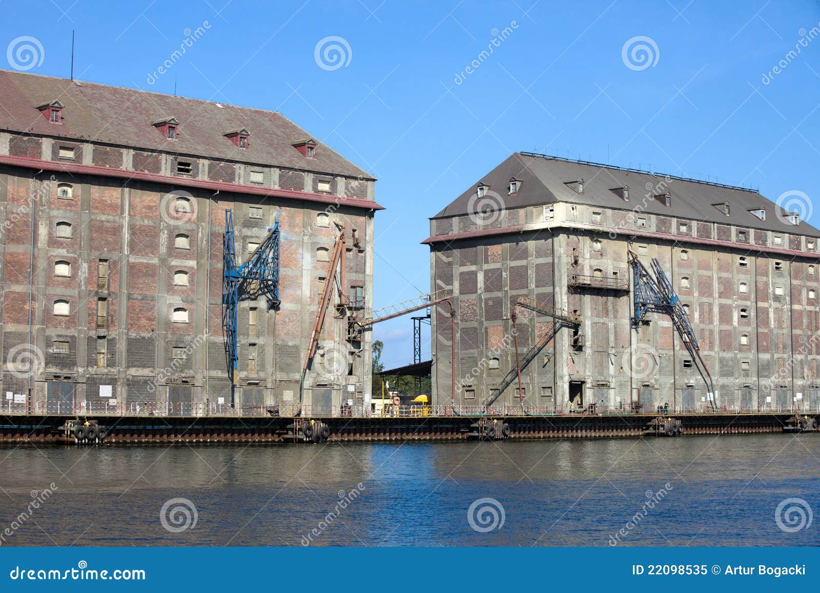 Old industrial buildings used as a granaries in the past at the Motlawa river waterfront in Gdansk, Poland