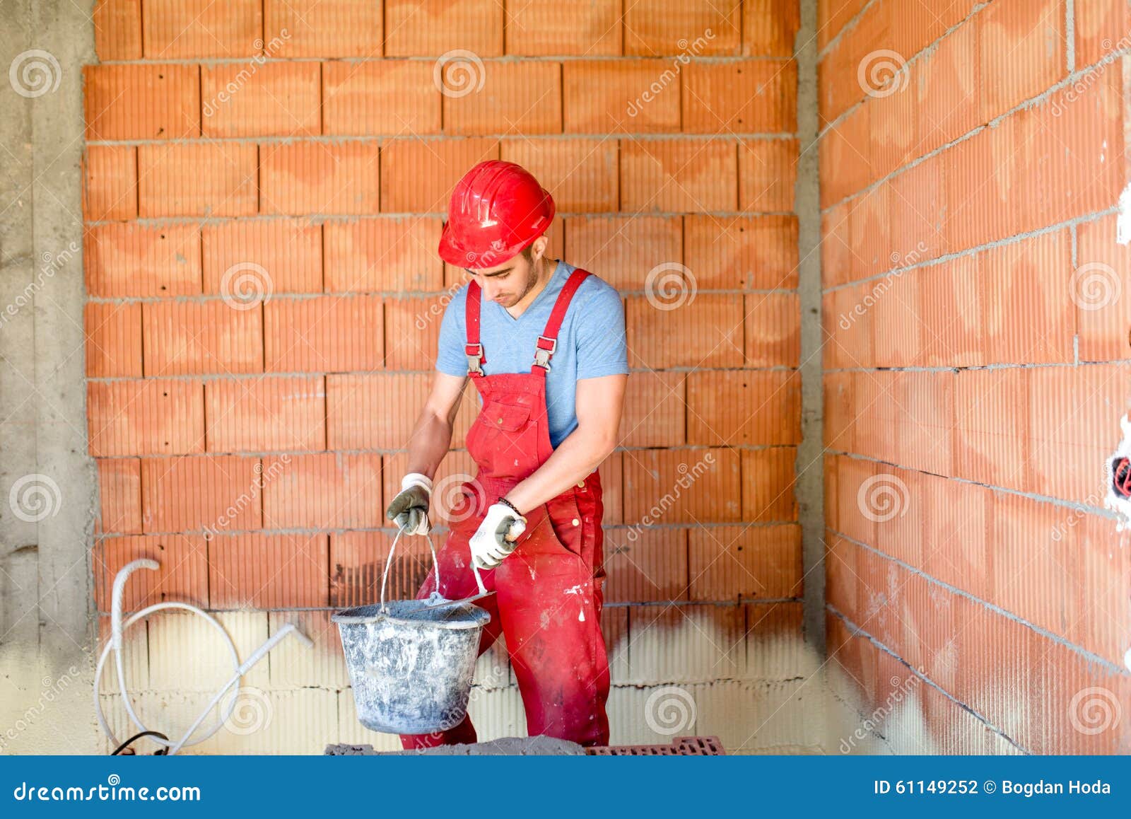 Industrial Construction Worker, Builder, Working on Construction Site