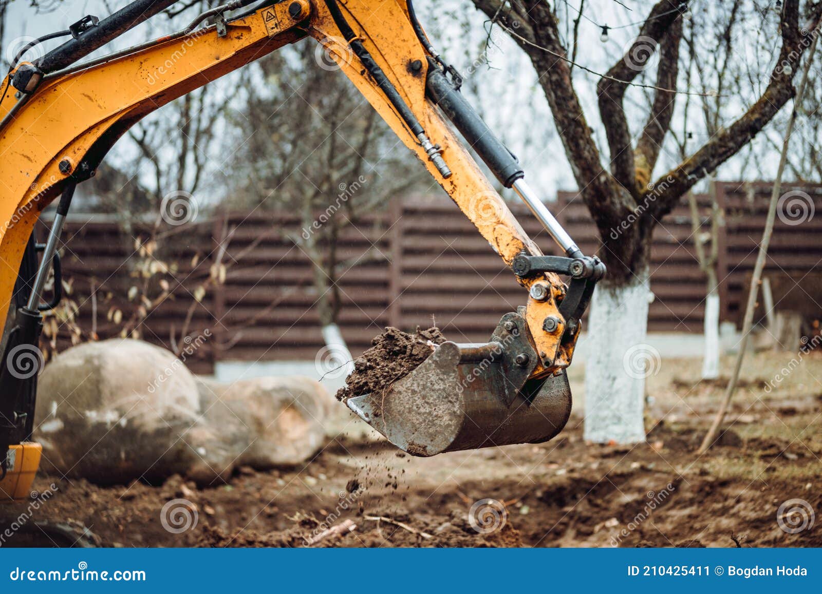 Industrial Excavator and Bulldozer Doing Landscaping Works Stock Image