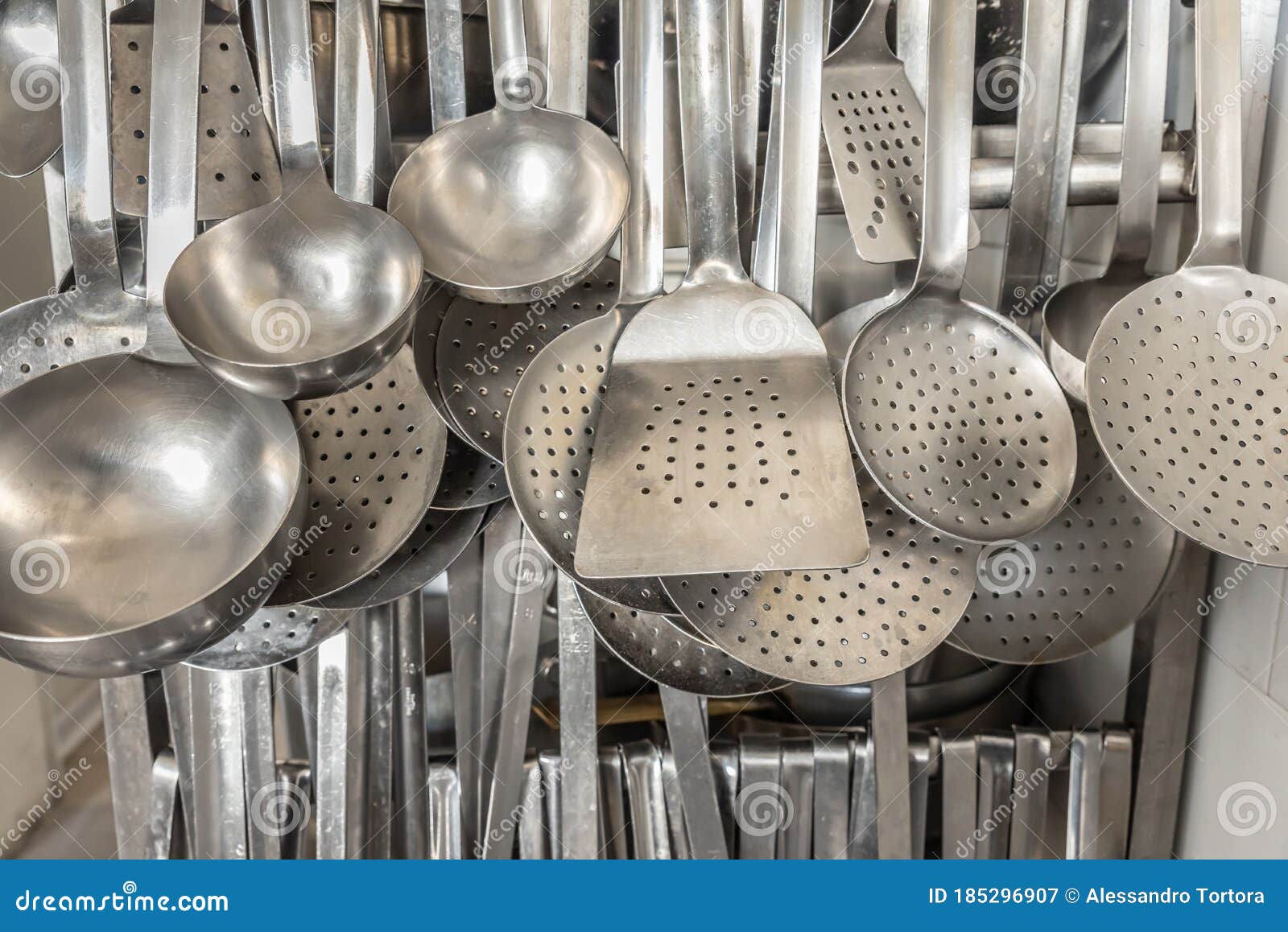 Industrial Kitchen with a Lot of Stuff. Huge Quantitiy Hanging Kitchen