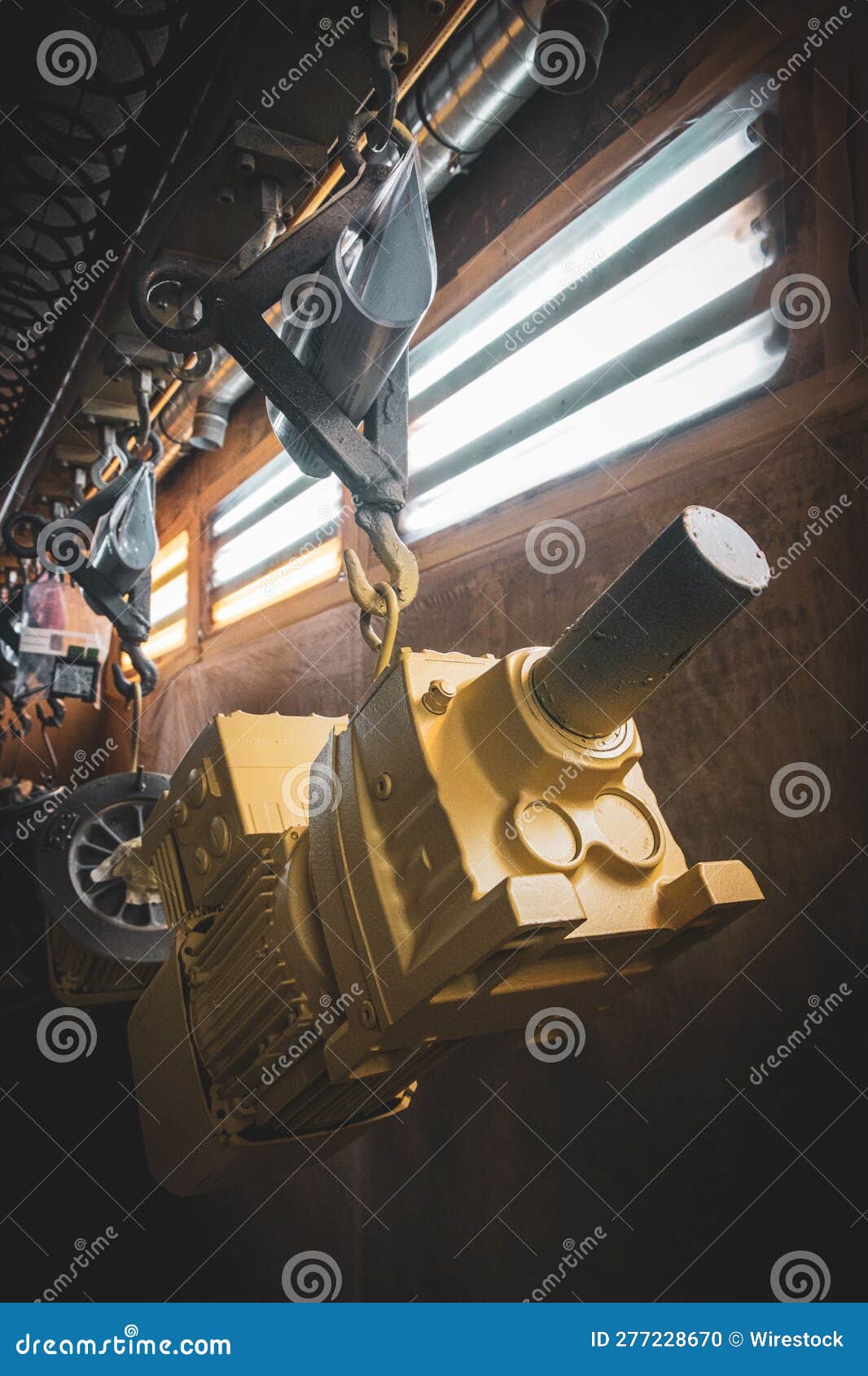 Industrial Machine Associated with Power Supply Equipment Located in a